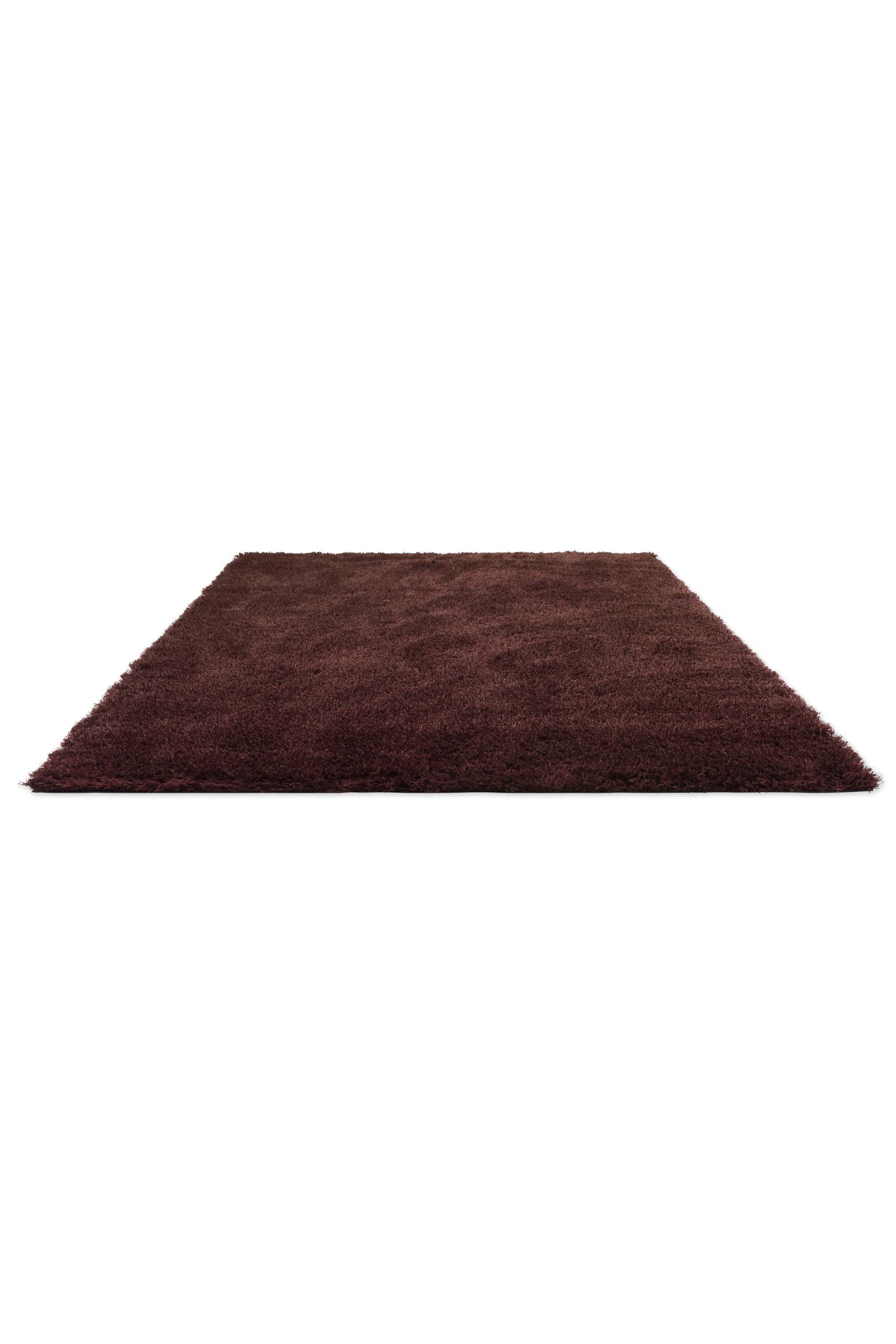 Plain red rug with shaggy pile