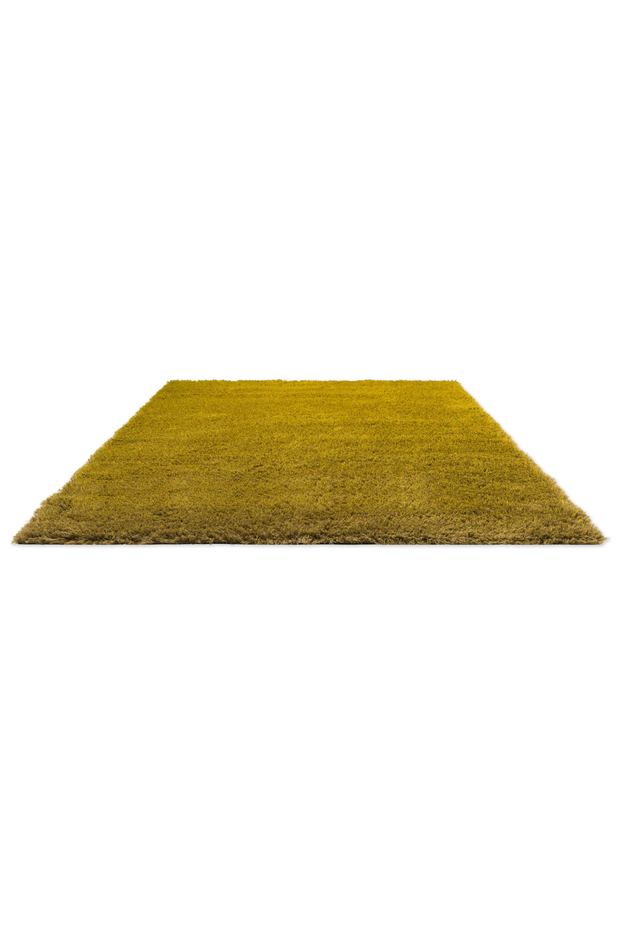 Plain yellow rug with shaggy pile