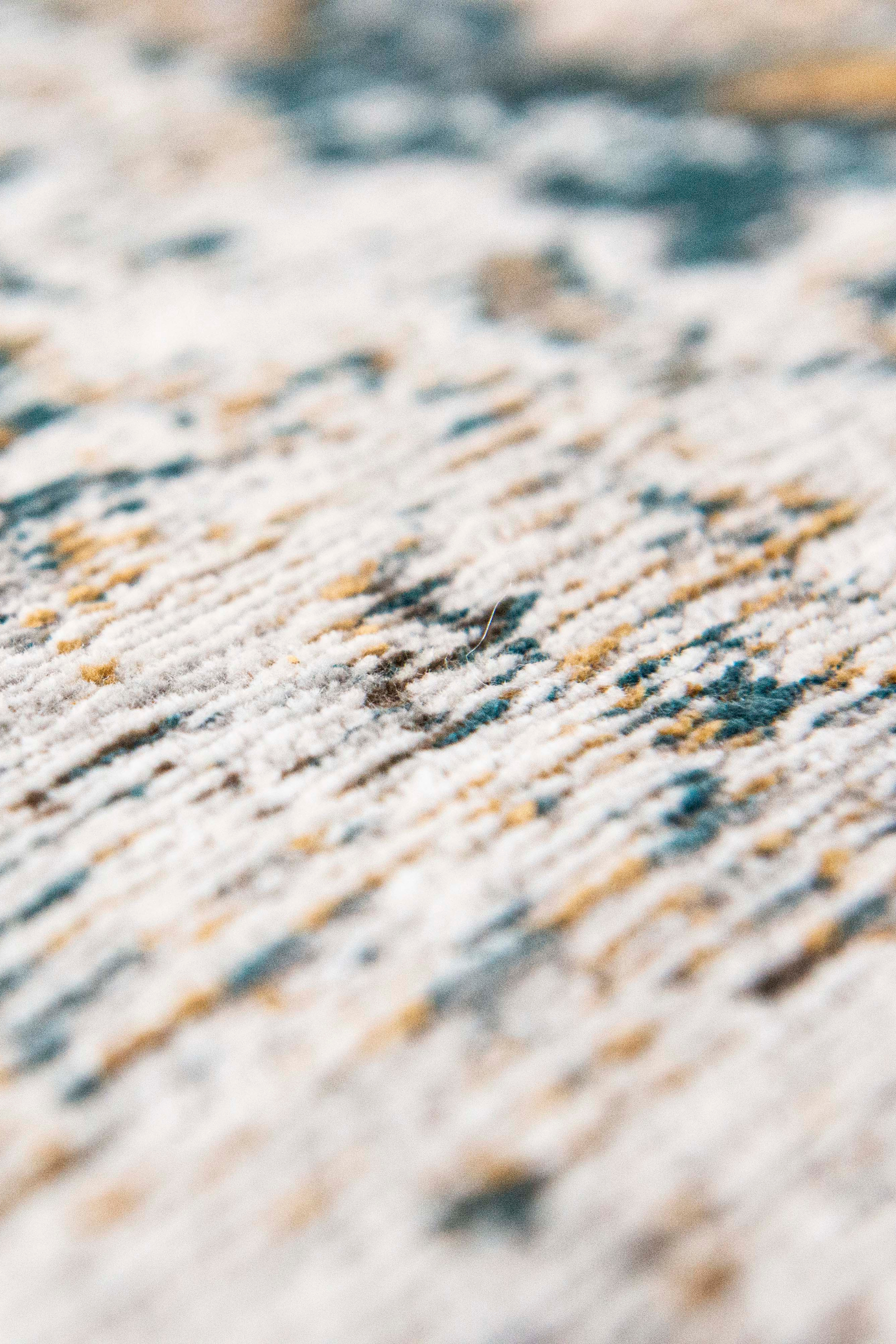 white, blue and yellow vintage style rug