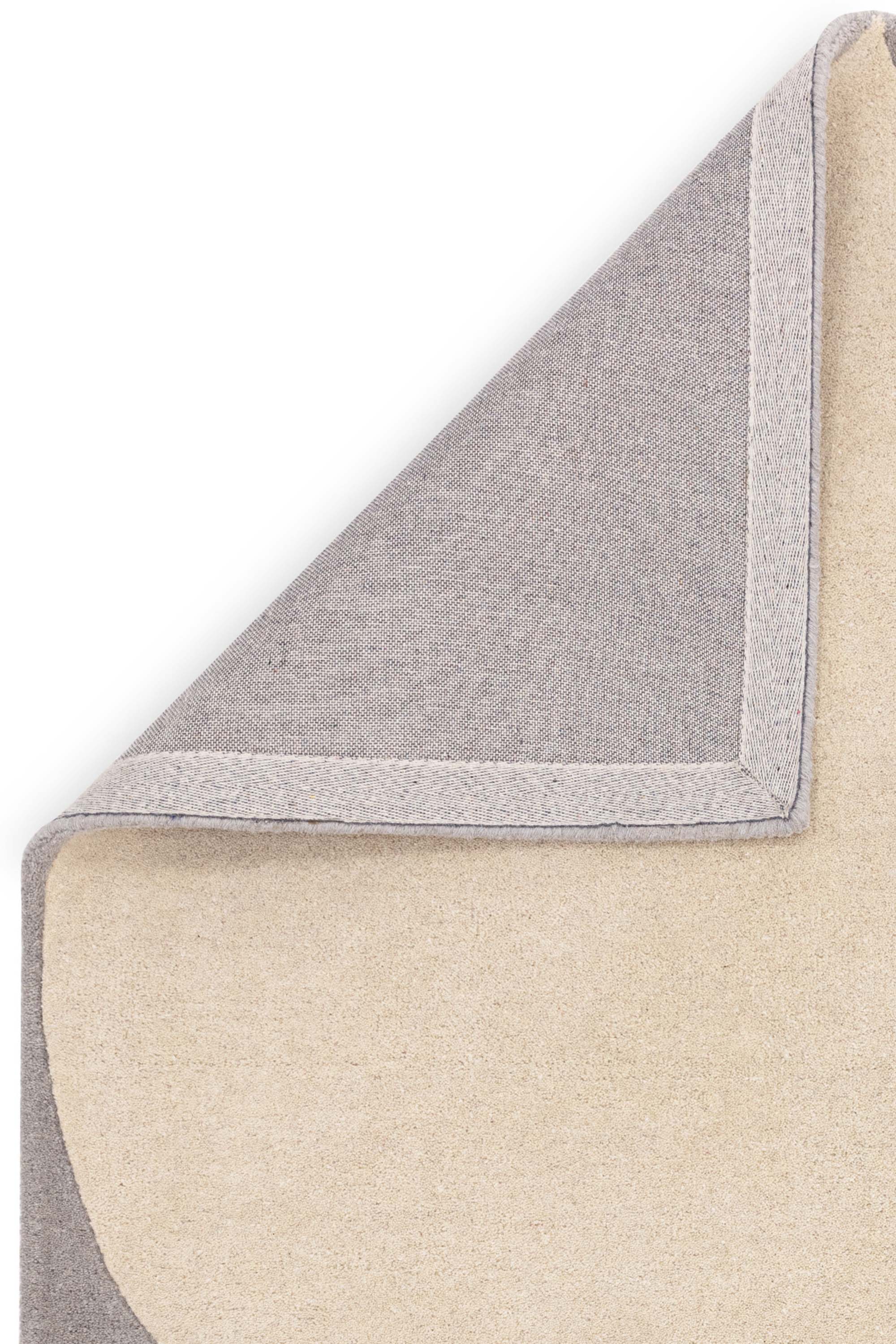 Abstract wool rug featuring a multicolour pattern