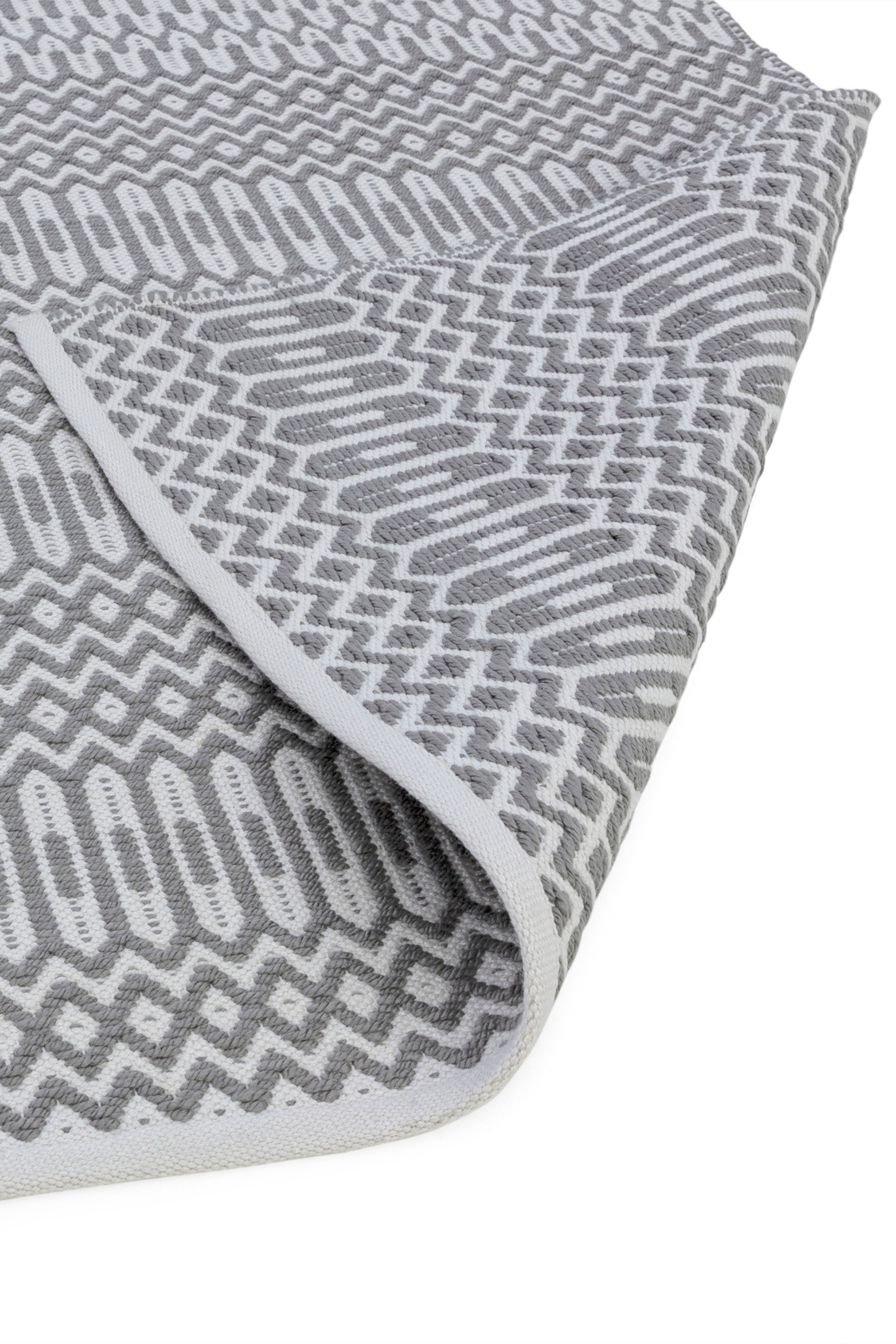 grey indoor/outdoor runner with geometric design