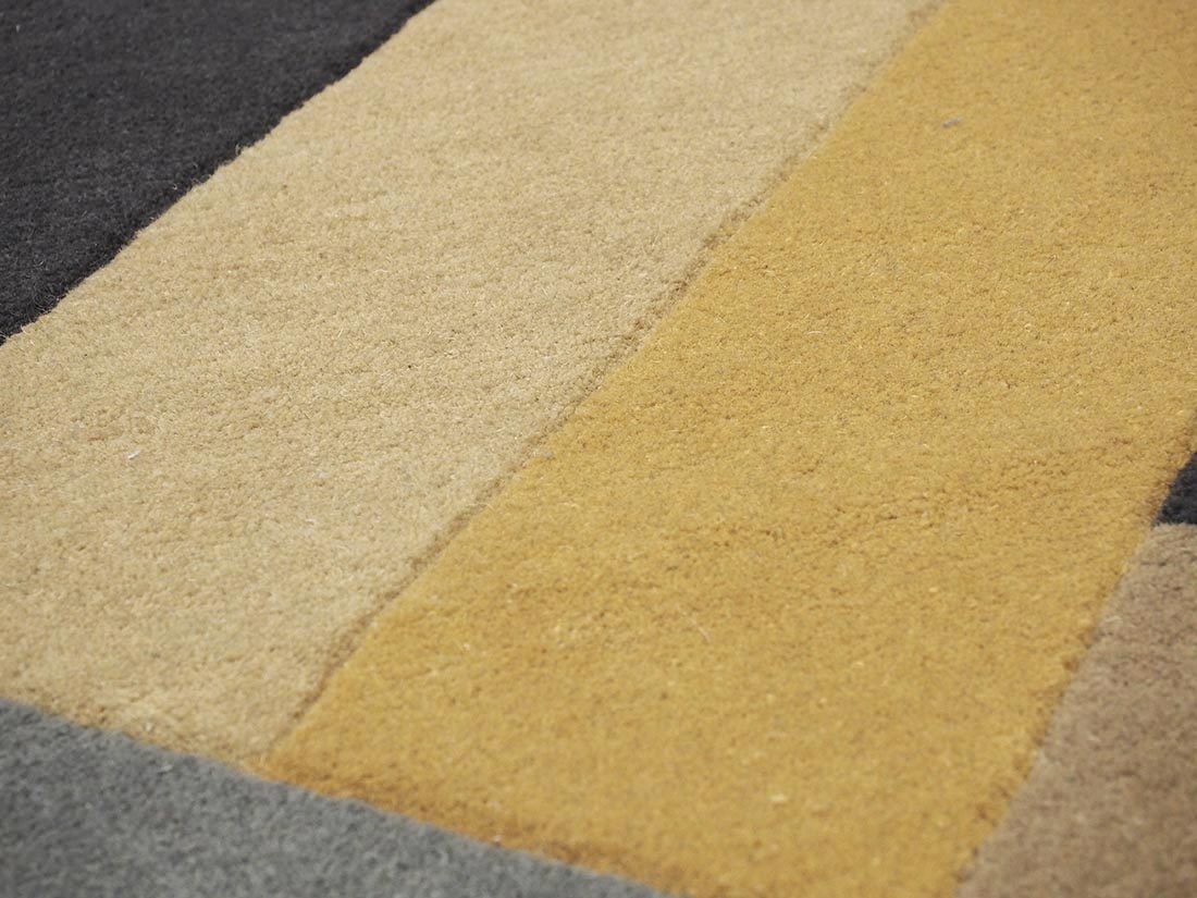 multicolour geometric runner in mustard yellow