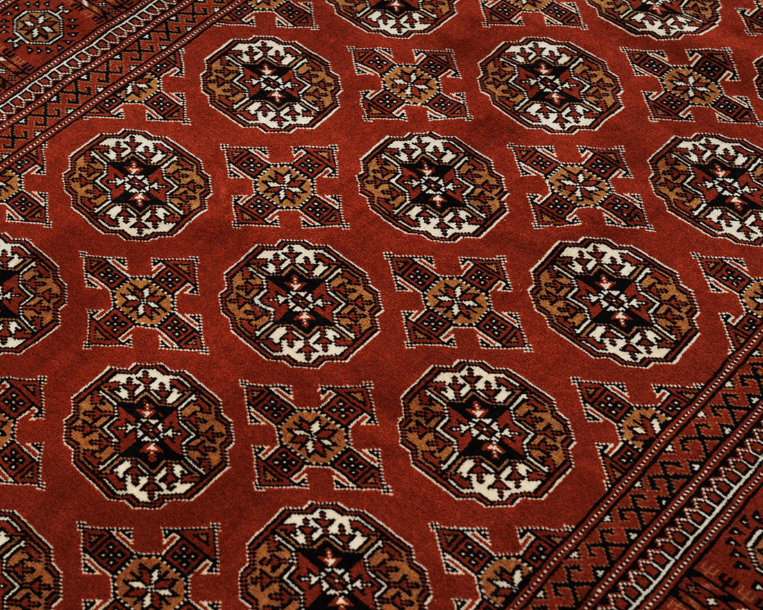 red oriental rug with traditional pattern