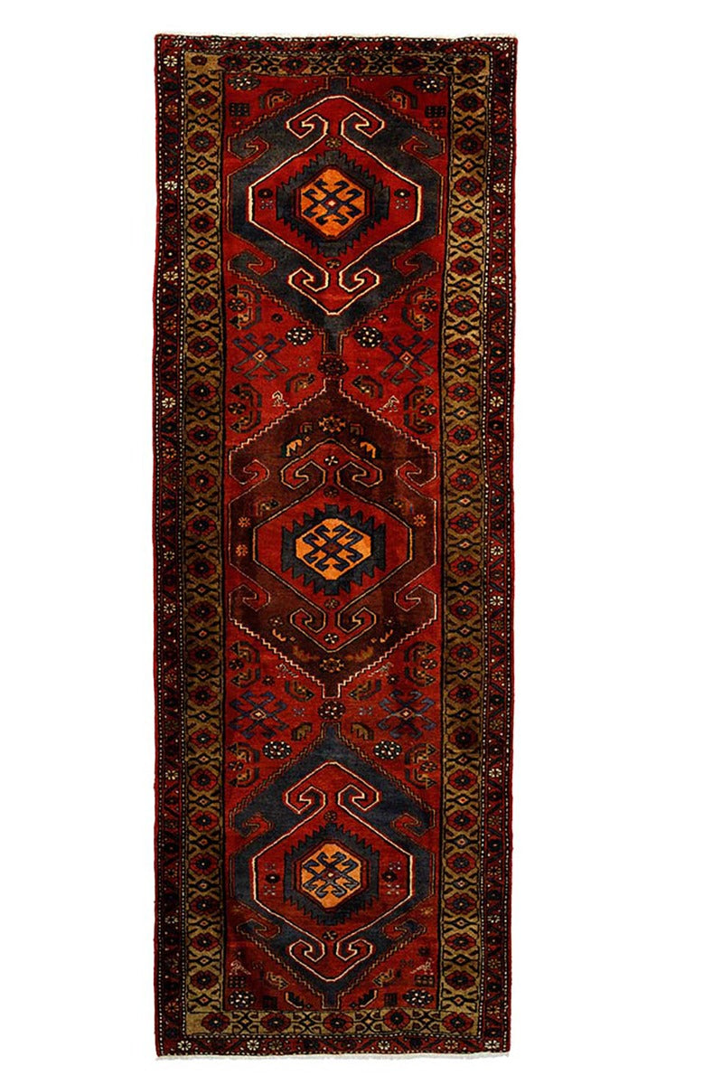 authentic persian runner with stylised geometric design in red