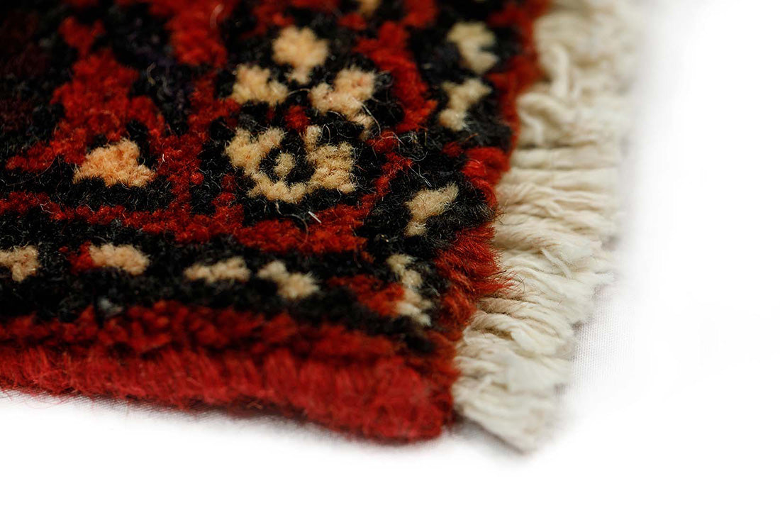 authentic persian runner with stylised geometric design in red