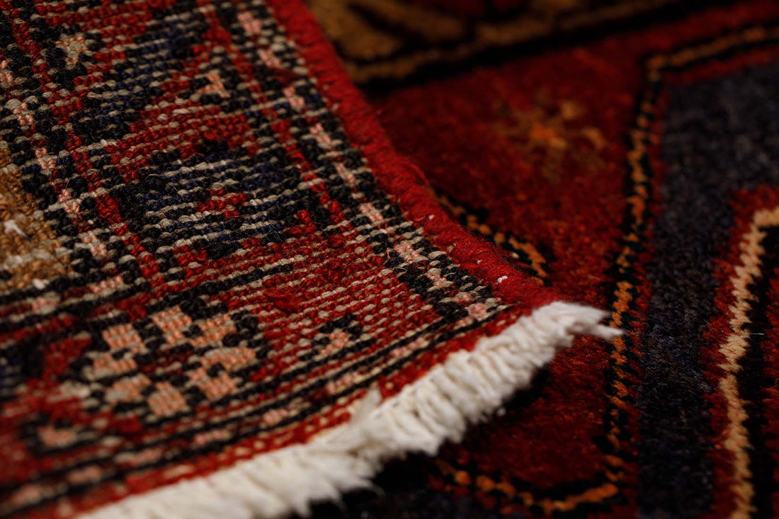 authentic persian runner with stylised geometric design in red