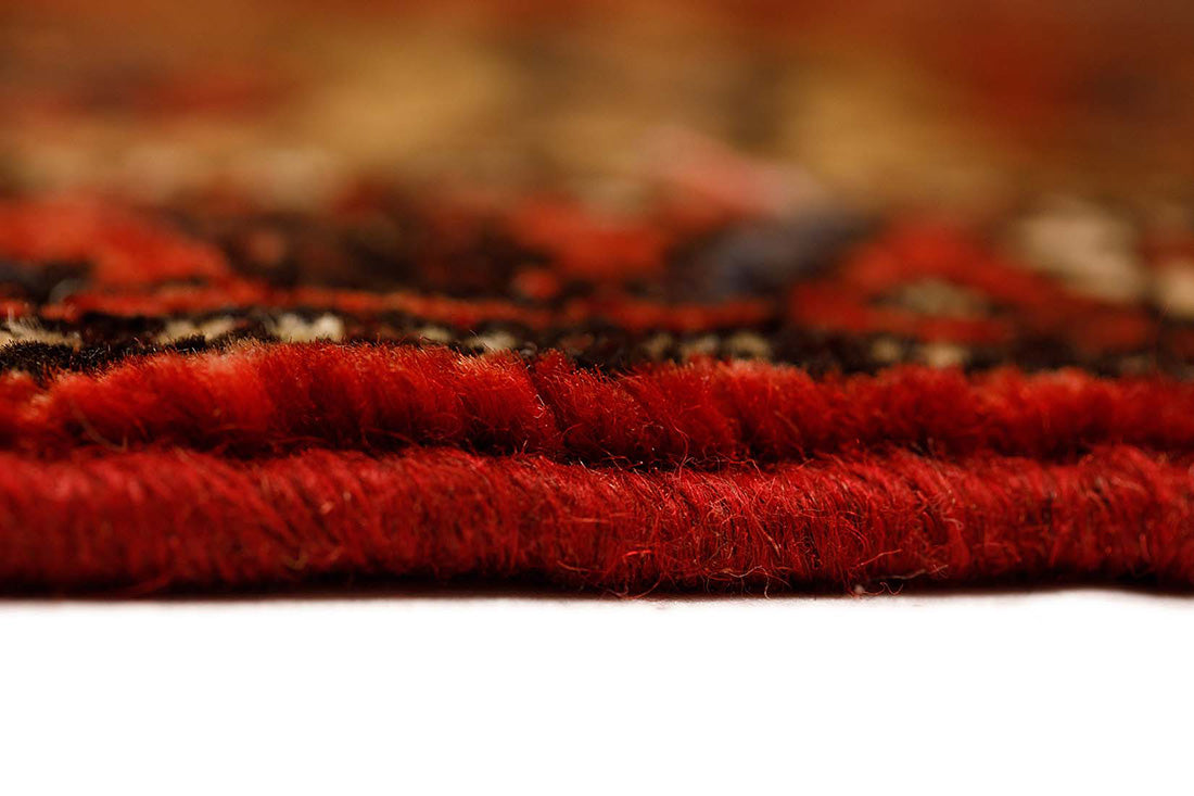 authentic persian runner with stylised geometric design in red