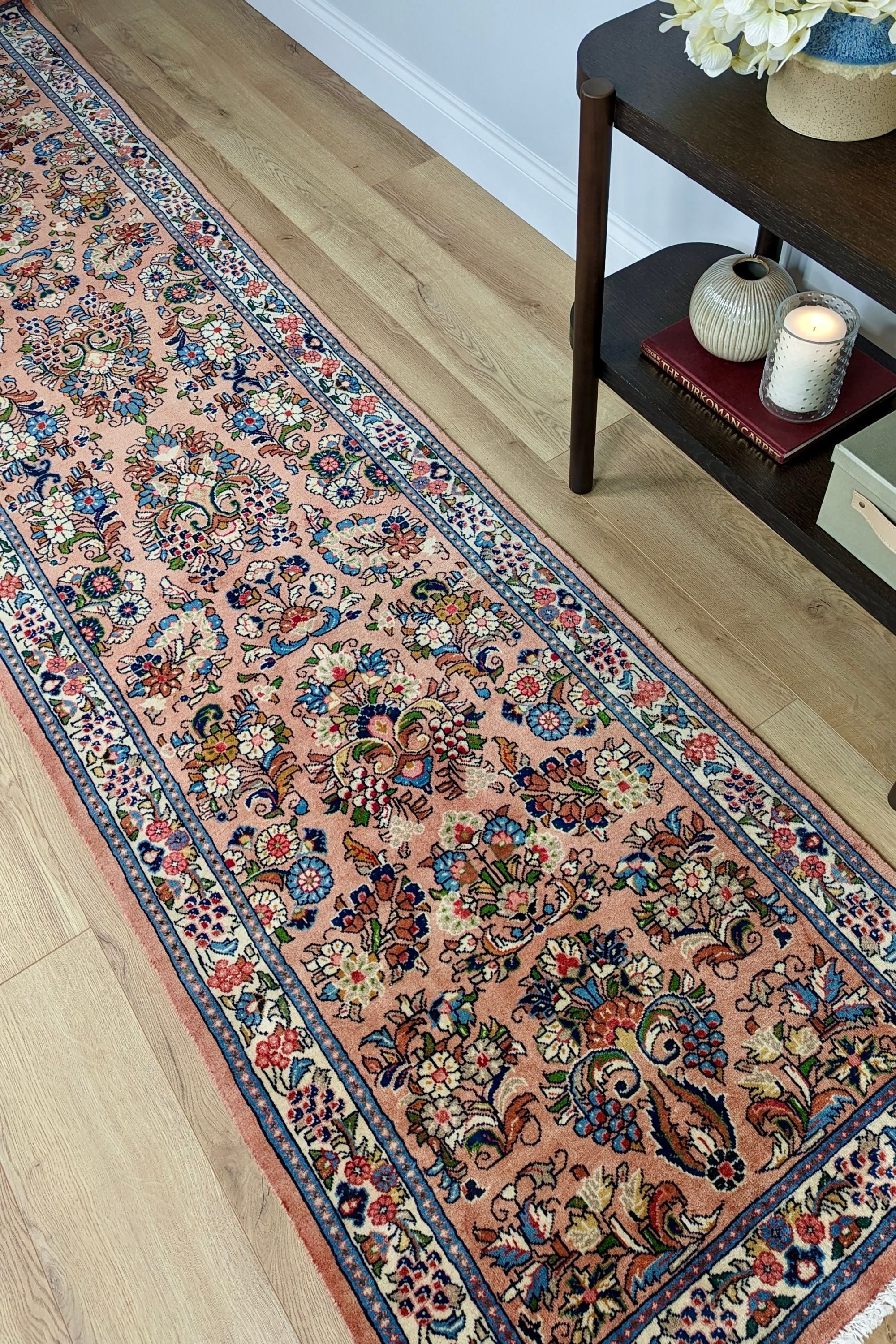 Authentic persian runner with traditional floral design in red