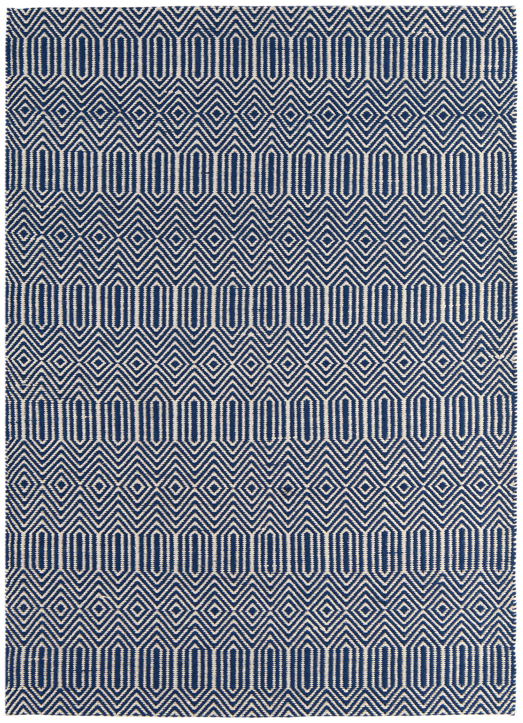 blue and white woven rug with aztec chevron pattern