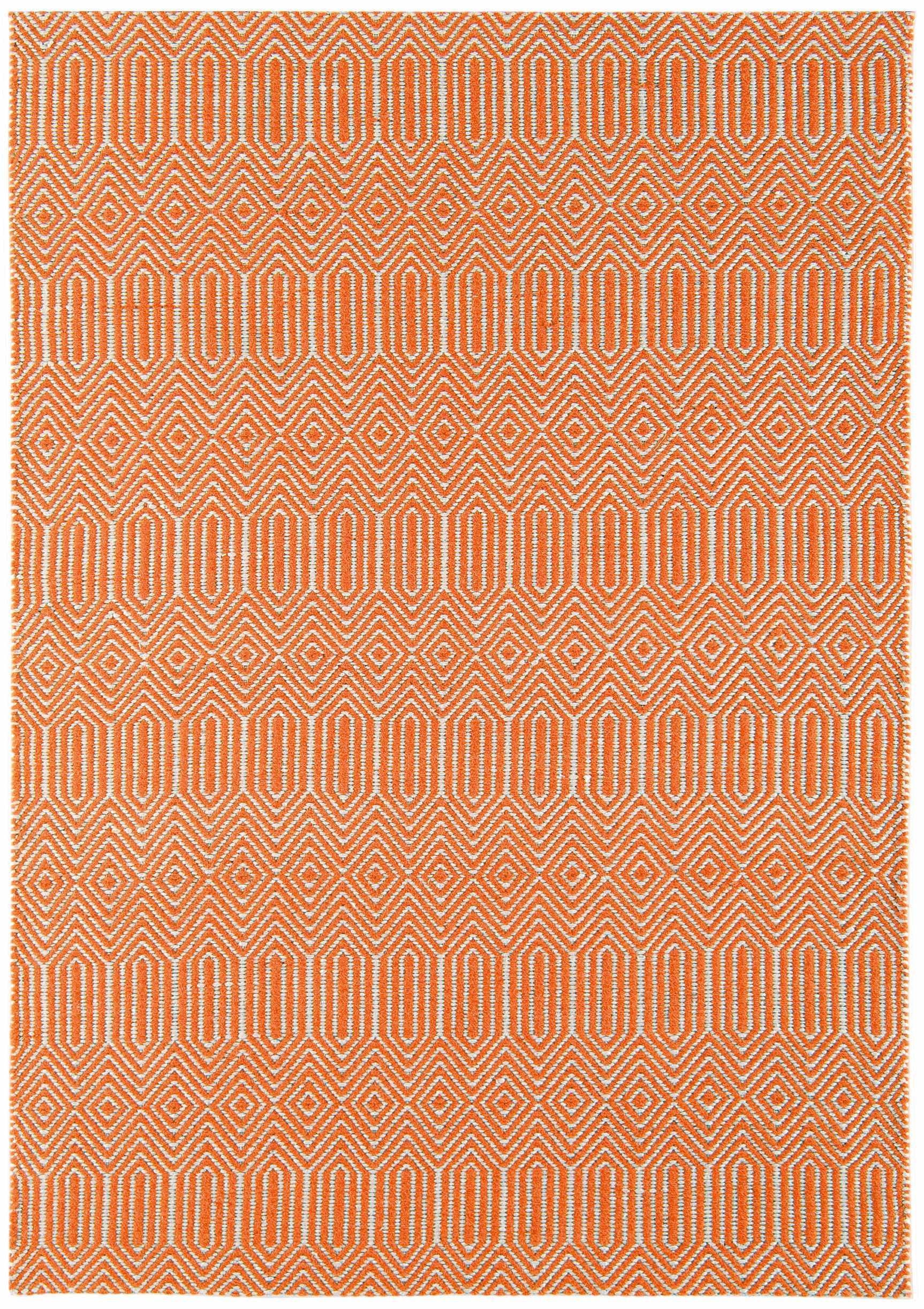 orange and white woven rug with aztec chevron pattern
