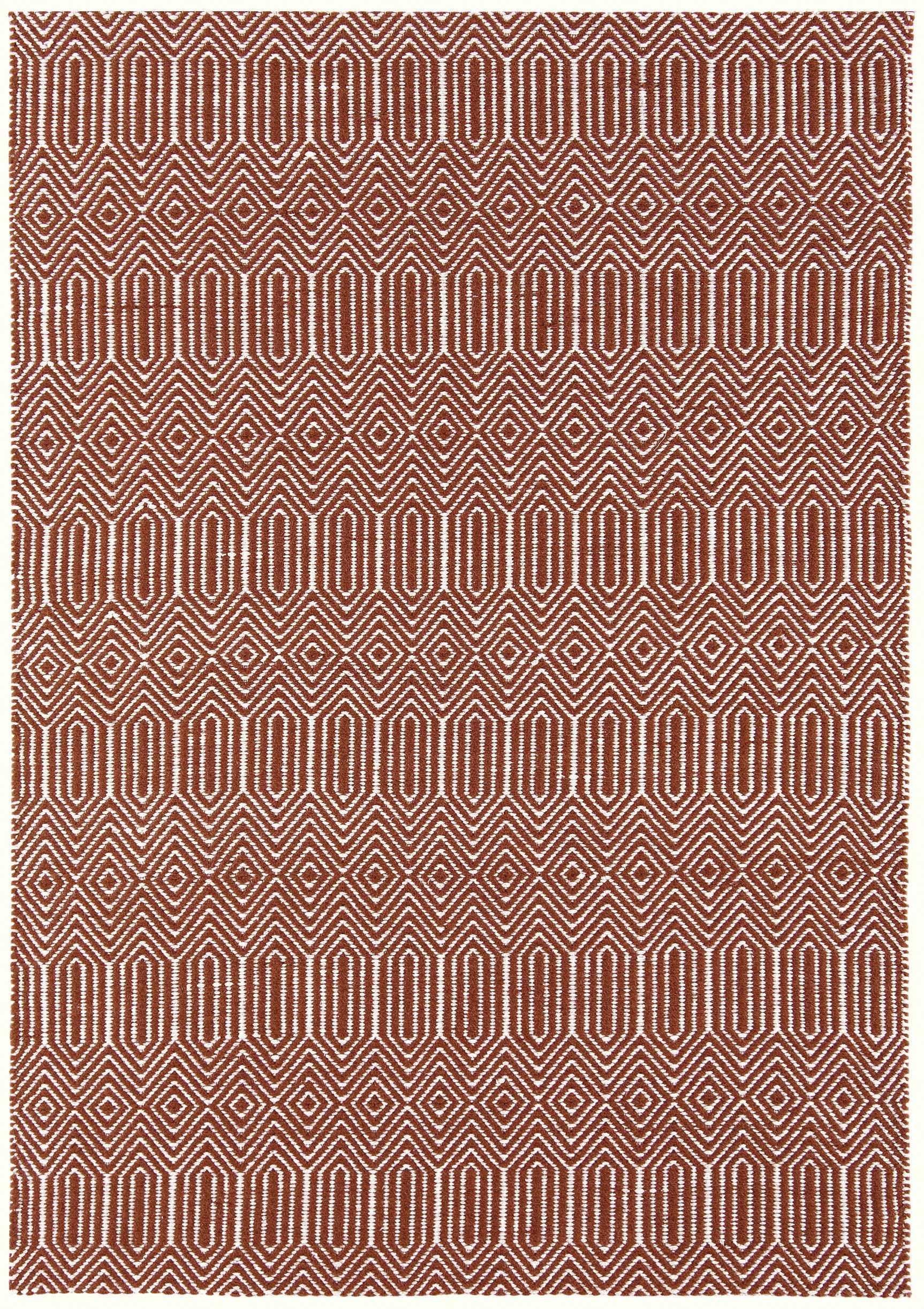 red and white woven rug with aztec chevron pattern