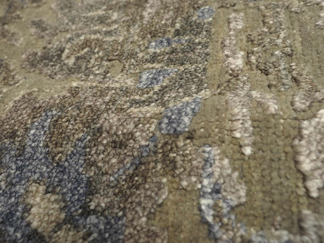 Authentic oriental rug with a damask pattern in beige