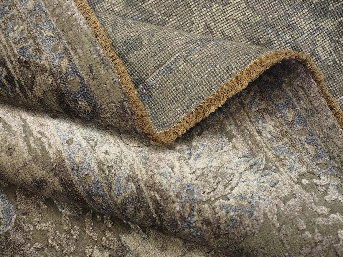 Authentic oriental rug with a damask pattern in beige