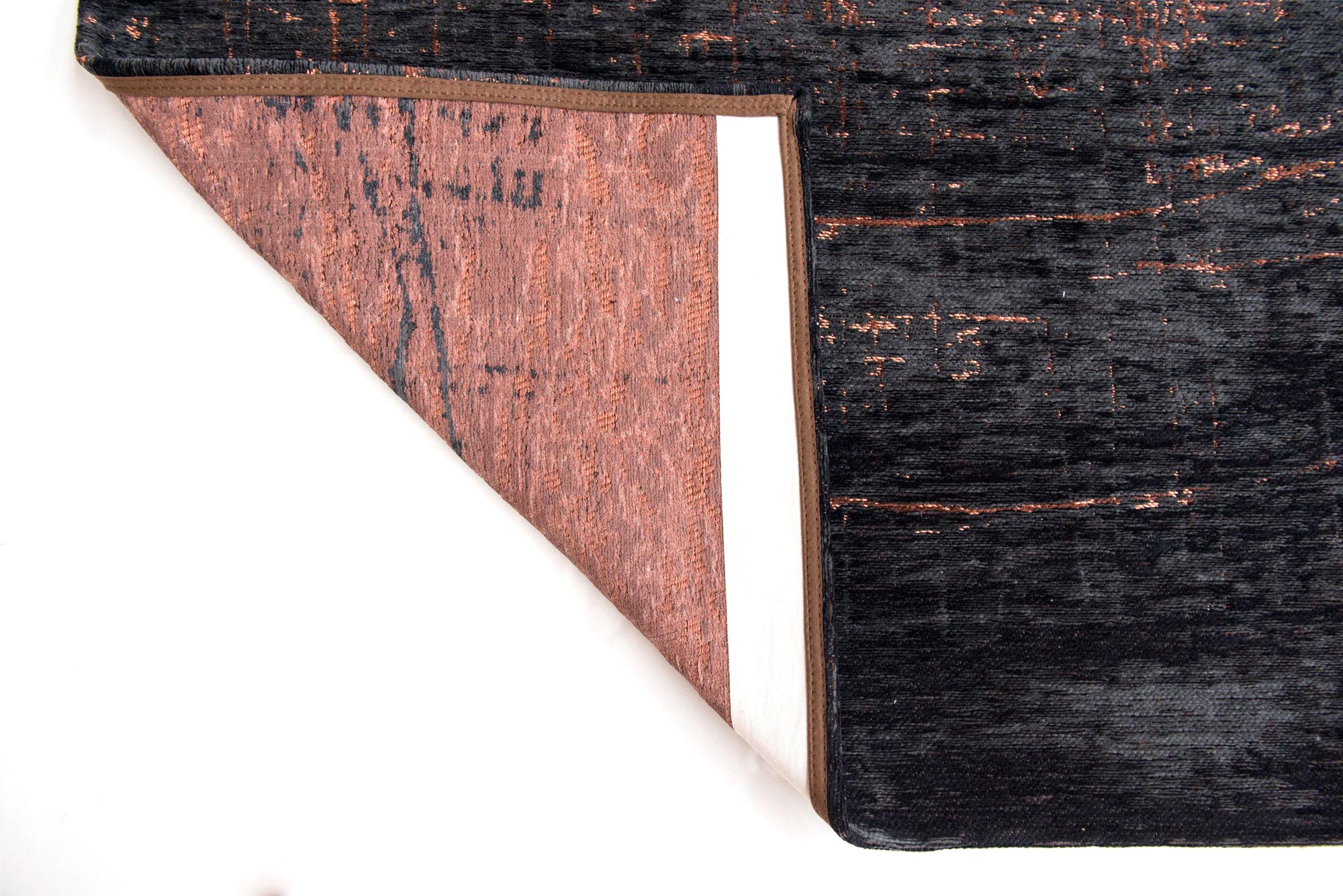 Black flatweave rug with copper brown abstract pattern