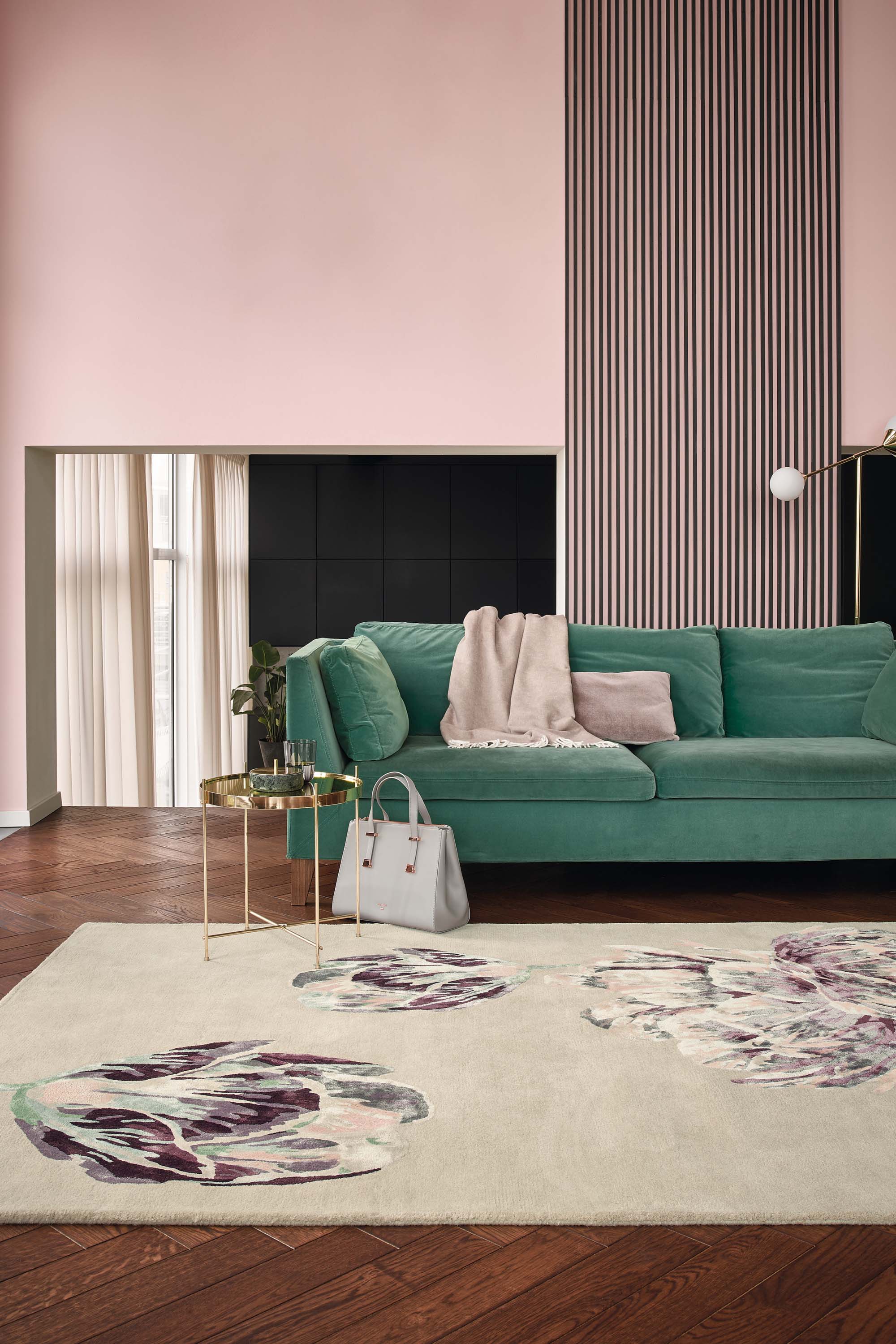 Rectangular beige rug with large white and purple flower motifs