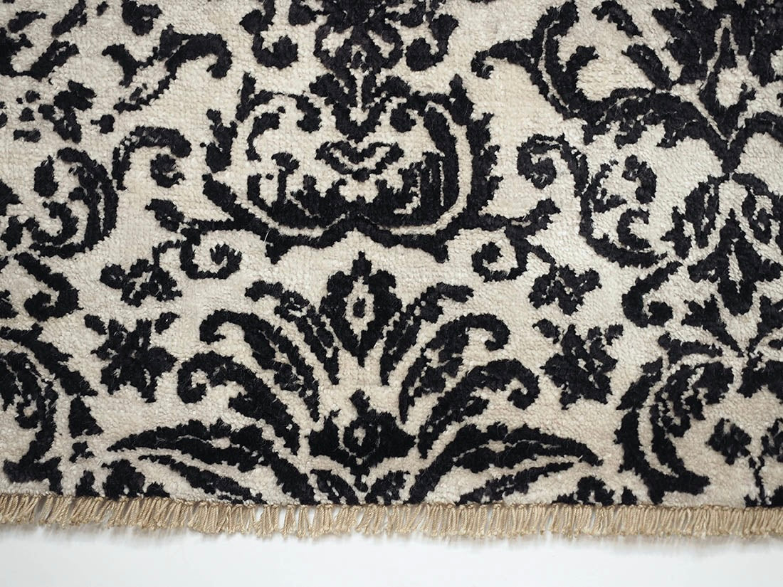 Authentic oriental rug with a damask pattern in brown