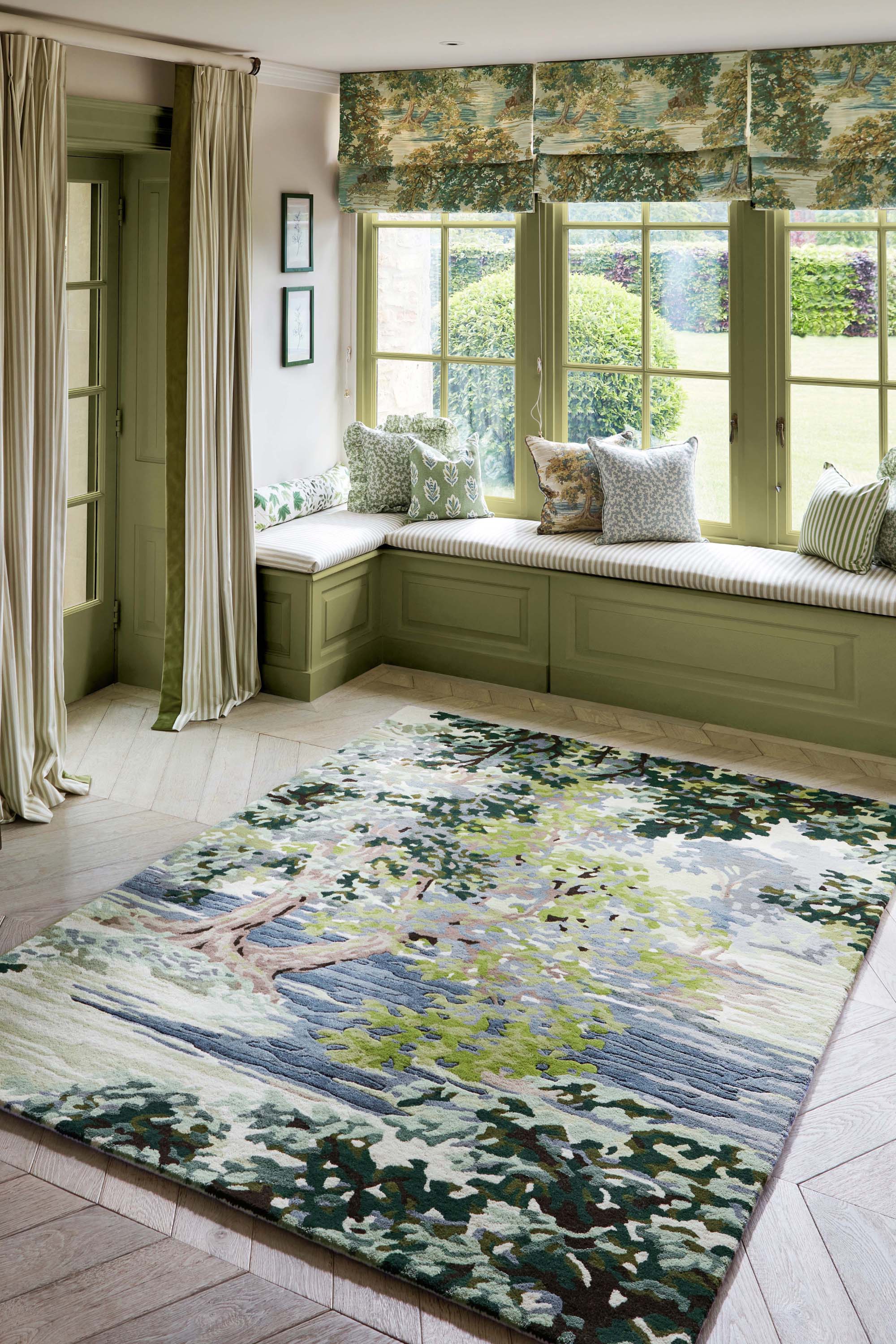 Green and blue floral rug with waterside pattern