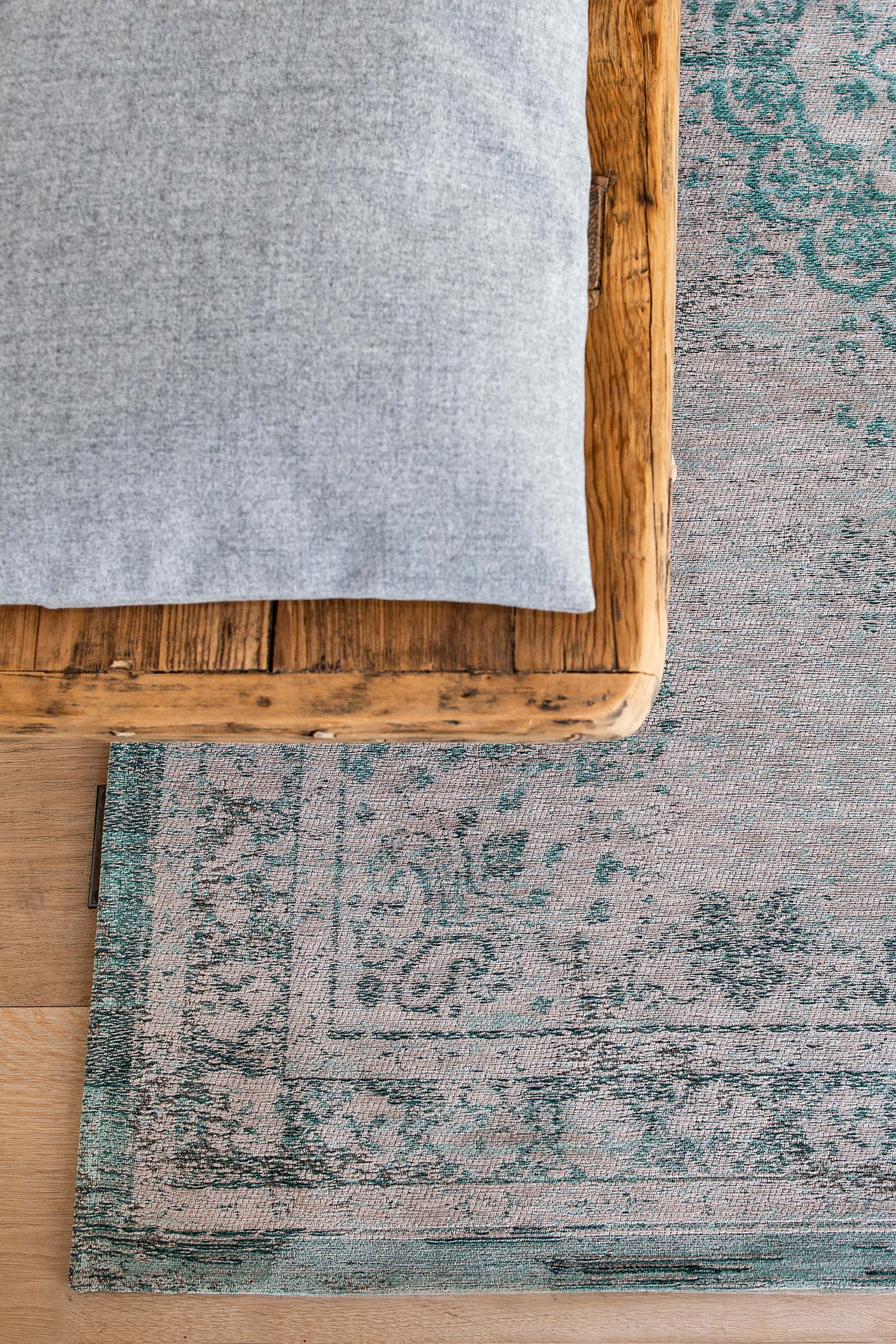 Grey flatweave rug with faded green persian design