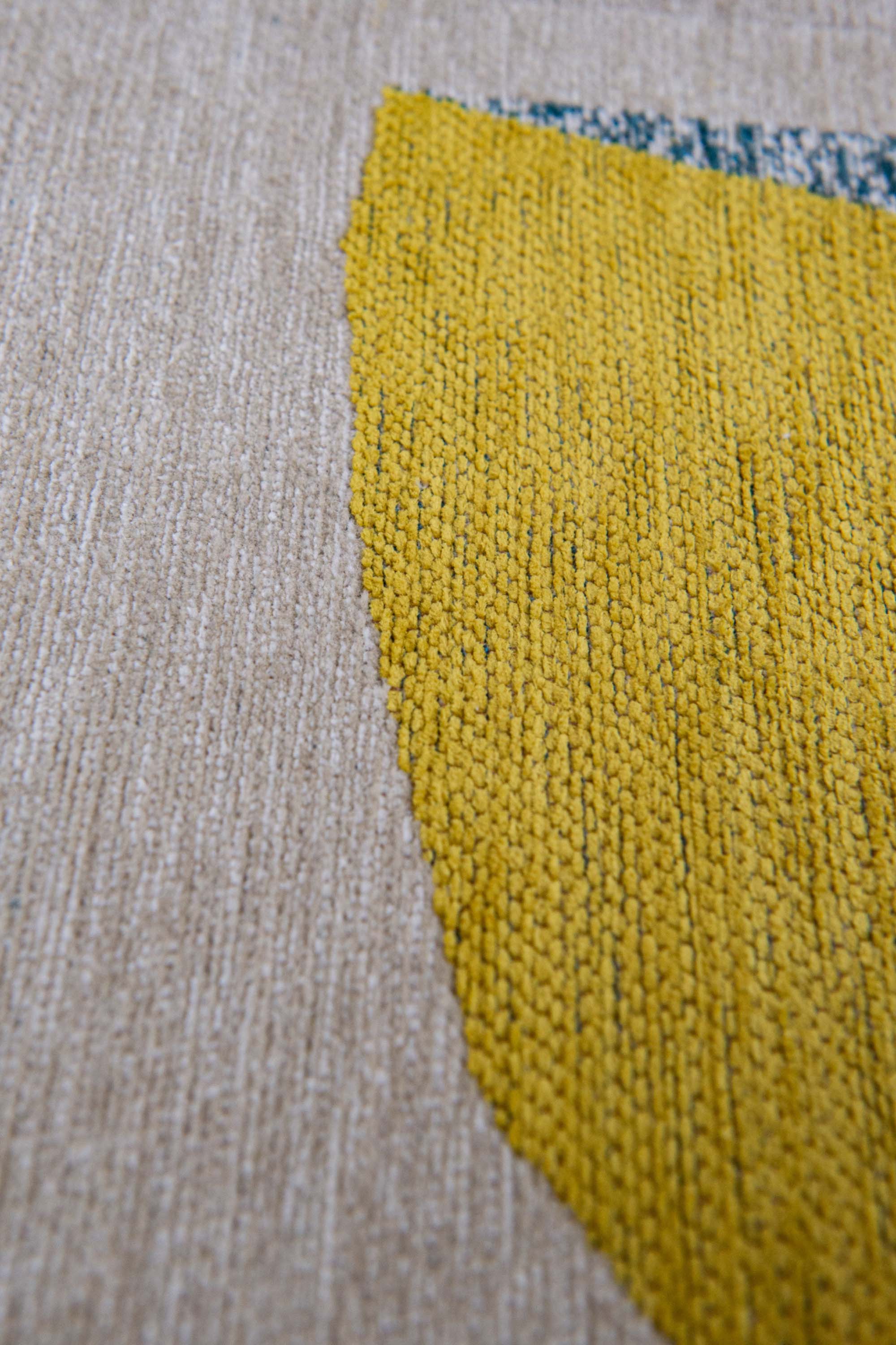 Modern rug with blue and yellow abstract pattern
