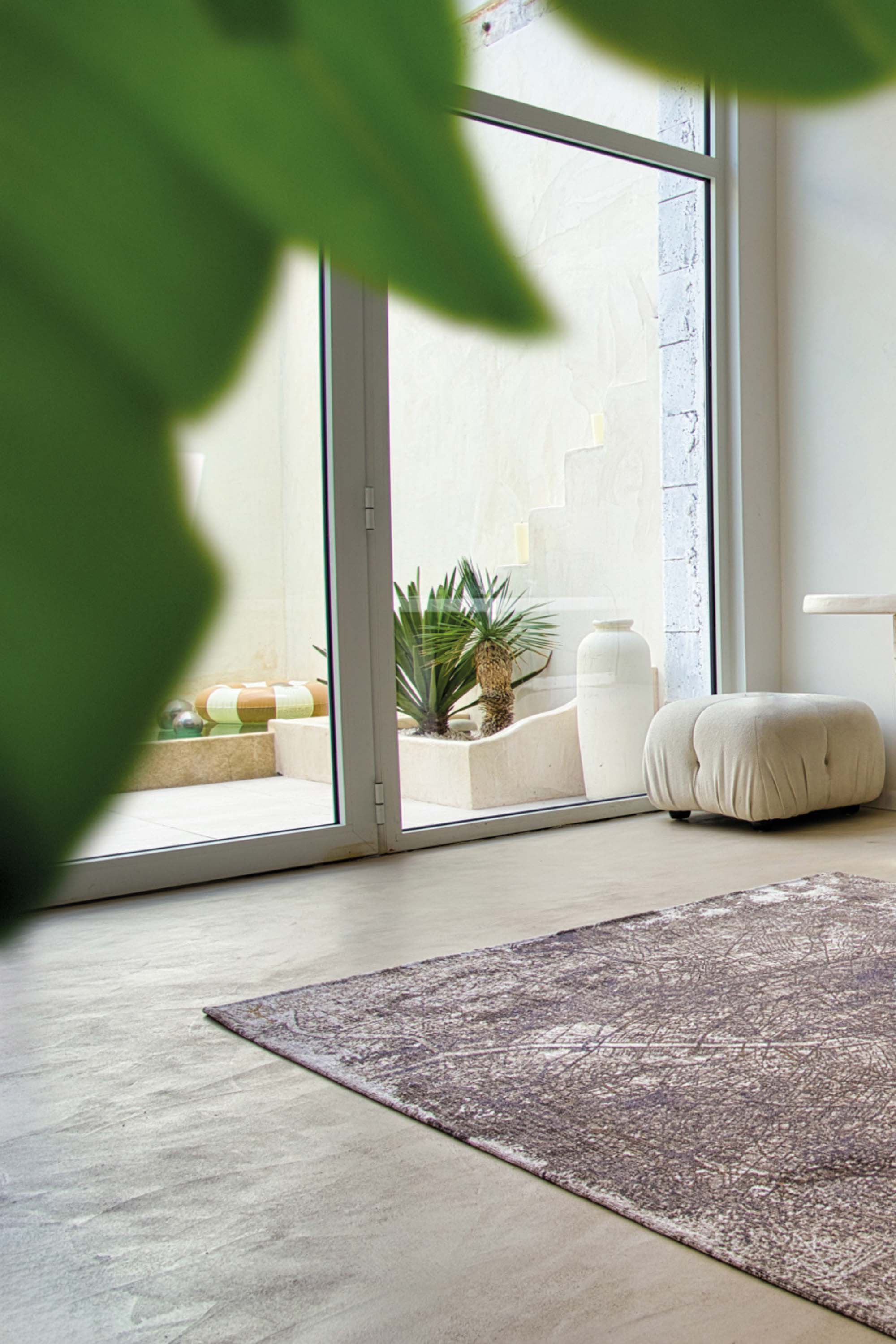 Silver abstract rug with a pattern inspired by the map of Paris