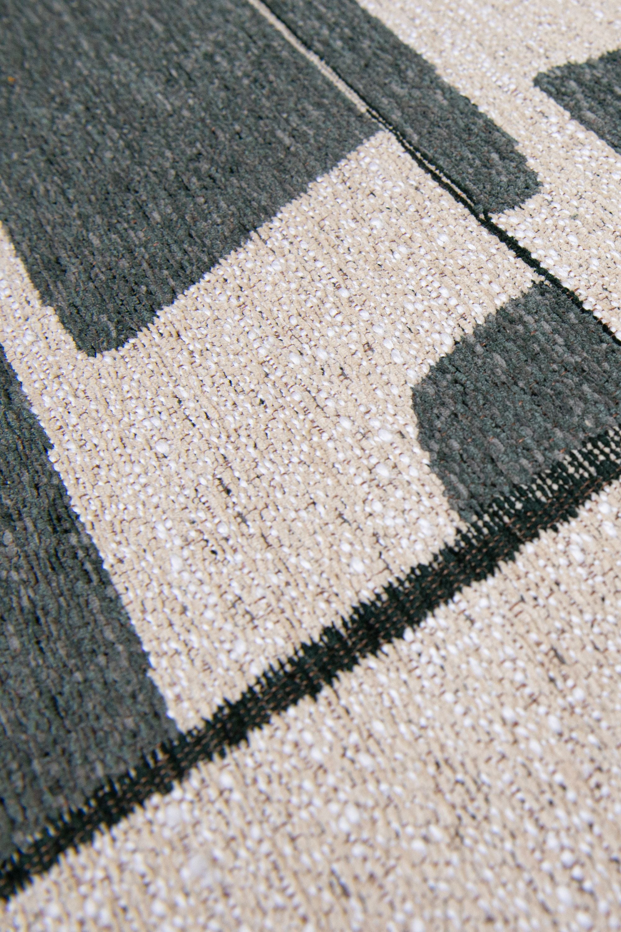 Modern abstract runner rug with green patchwork pattern
