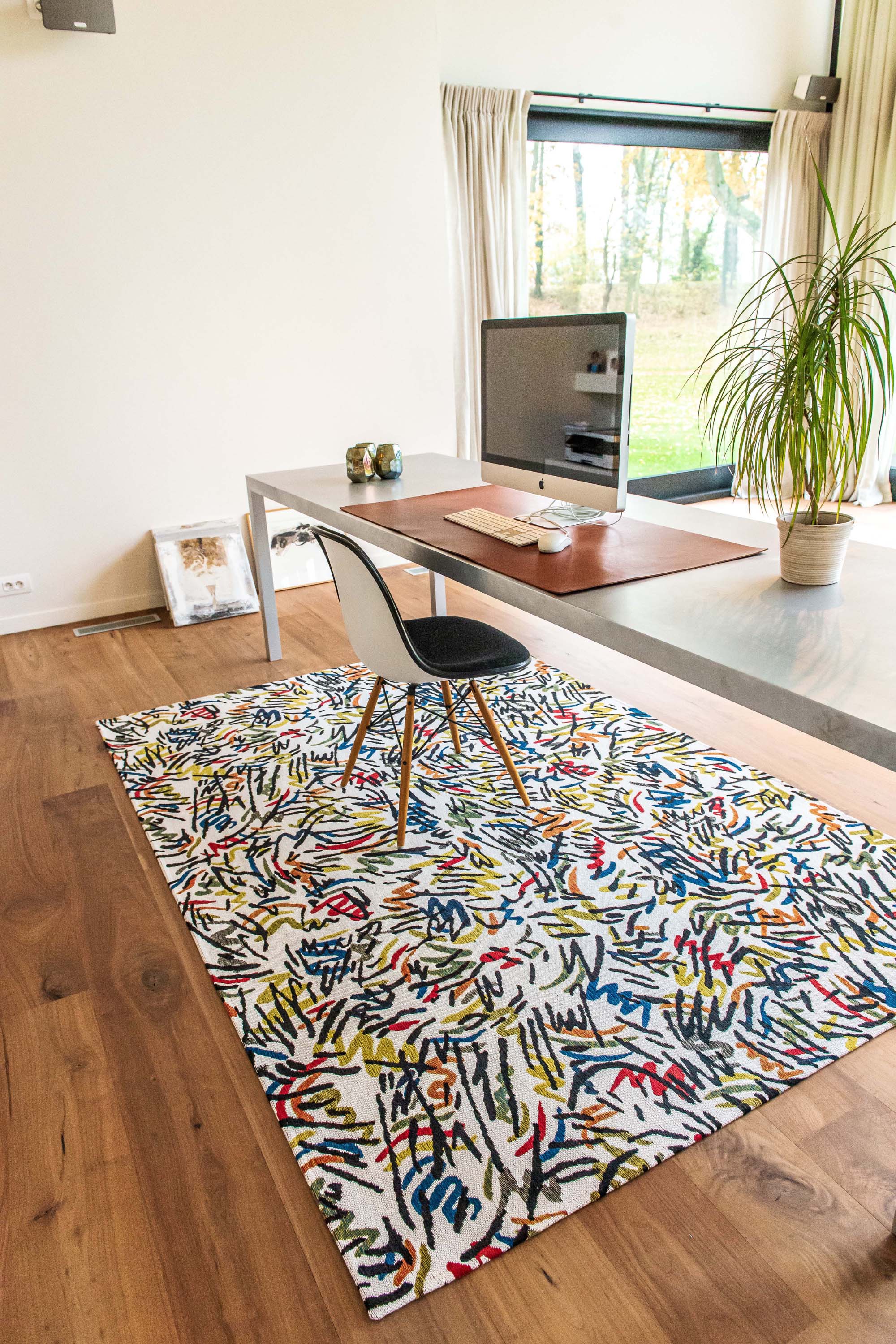 multicolour abstract rug with a squiggle design