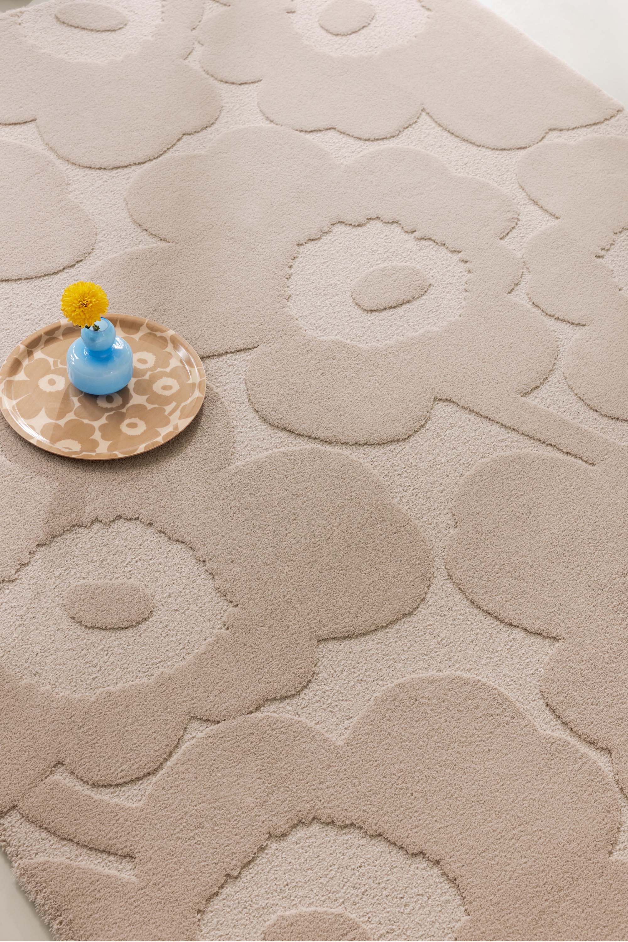 Beige patterned floral rug