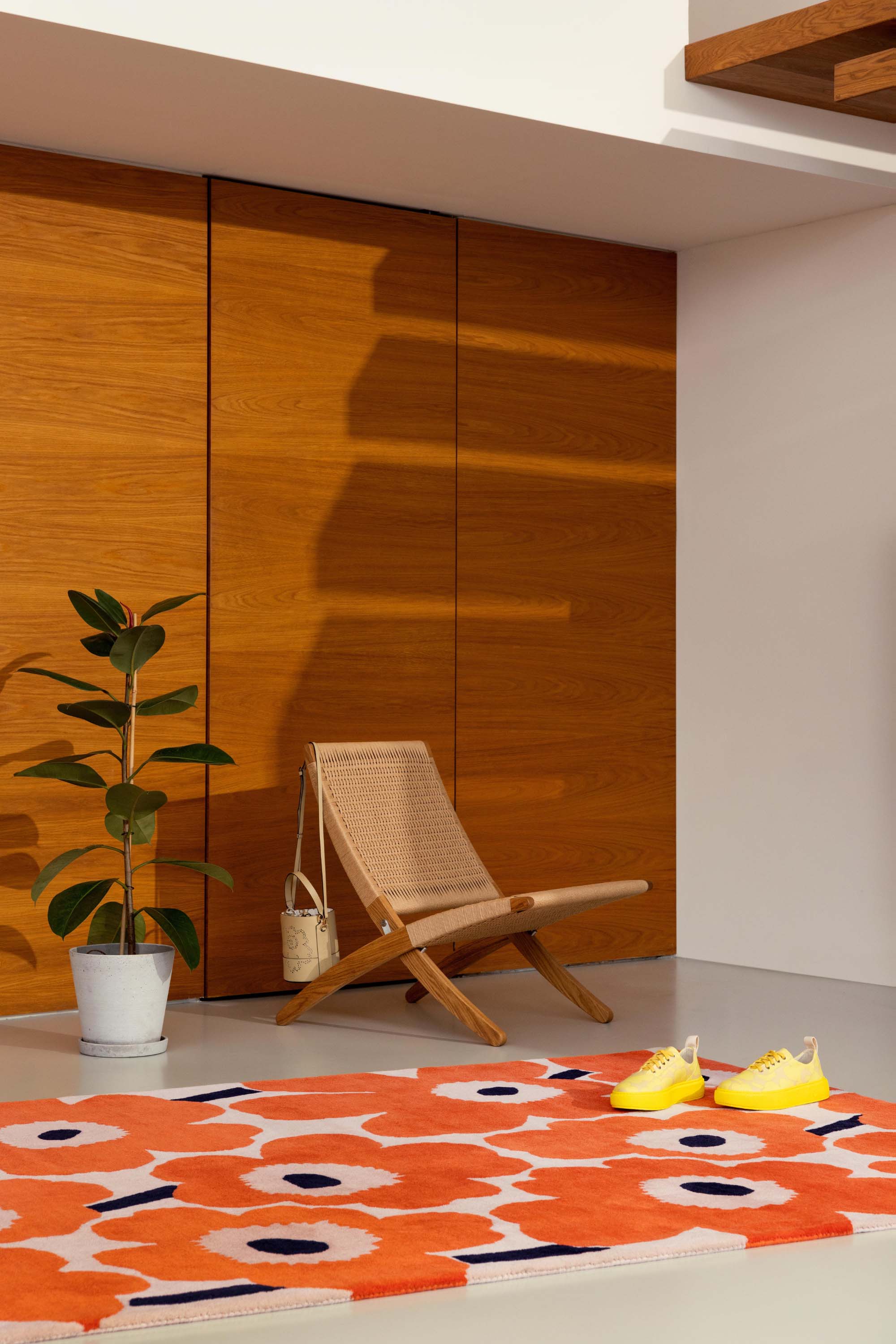 Orange patterned floral rug