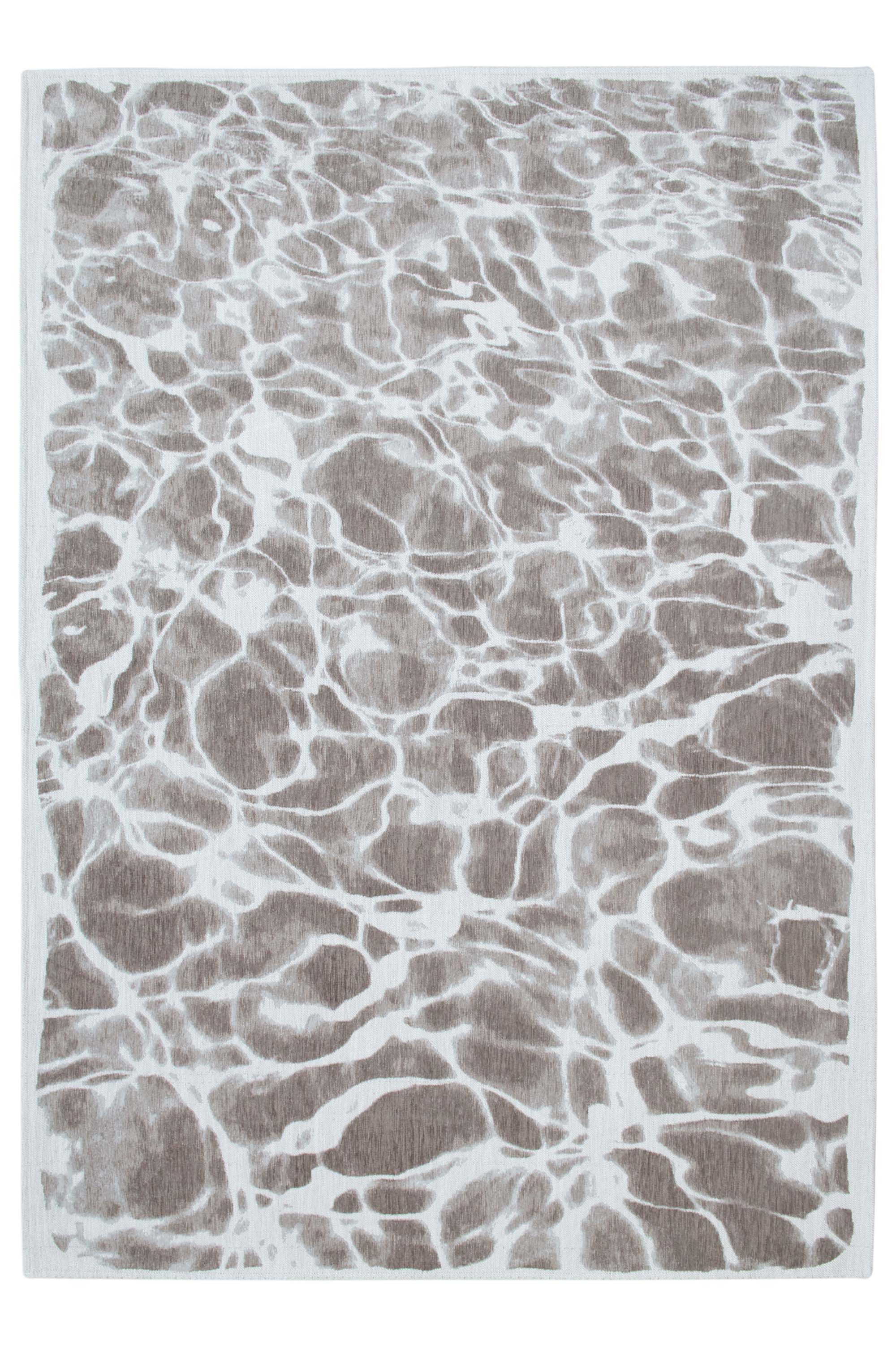 Modern circle rug with silver abstract water inspired pattern