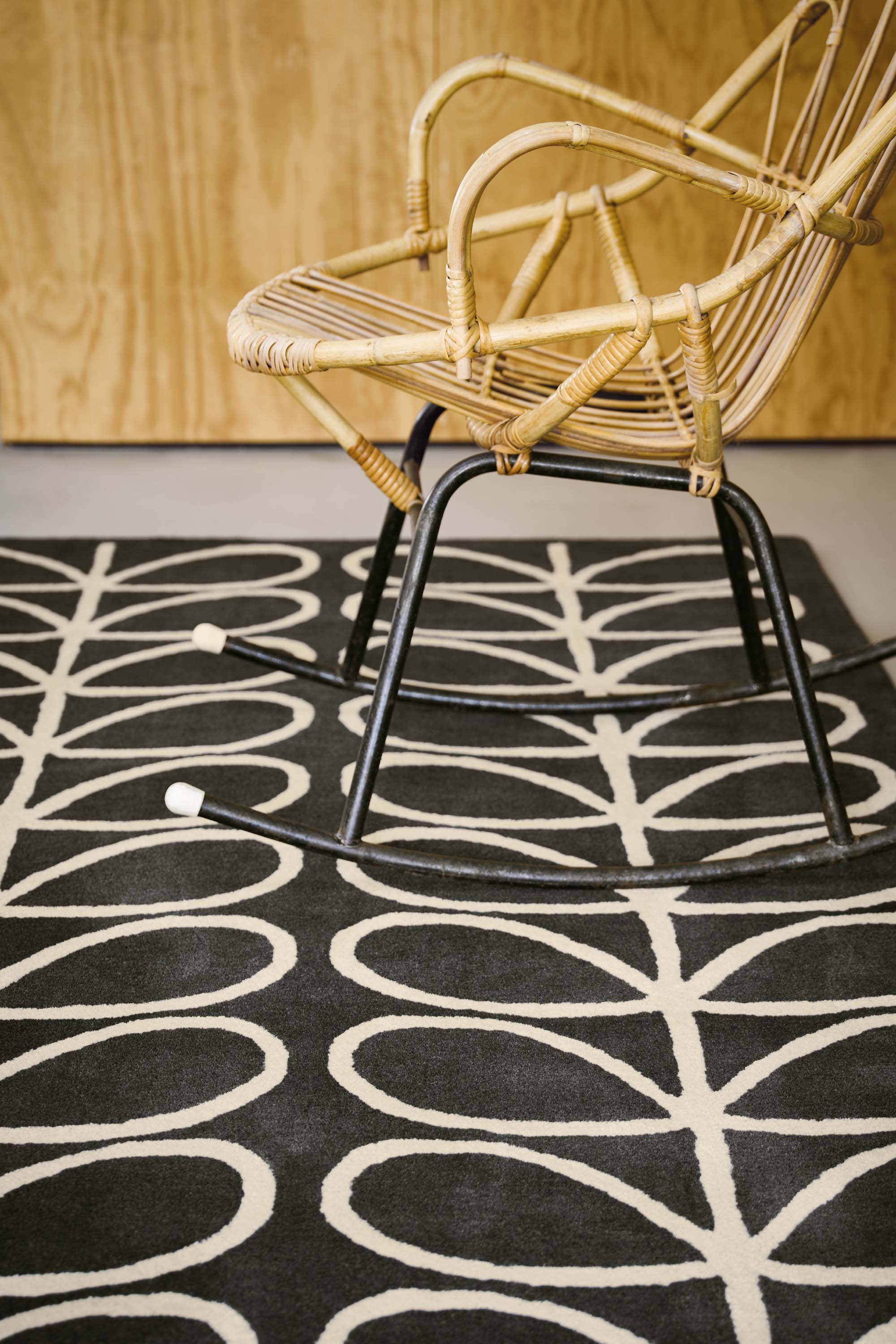 orla kiely giant linear stem slate rug - grey rug with a leaf design