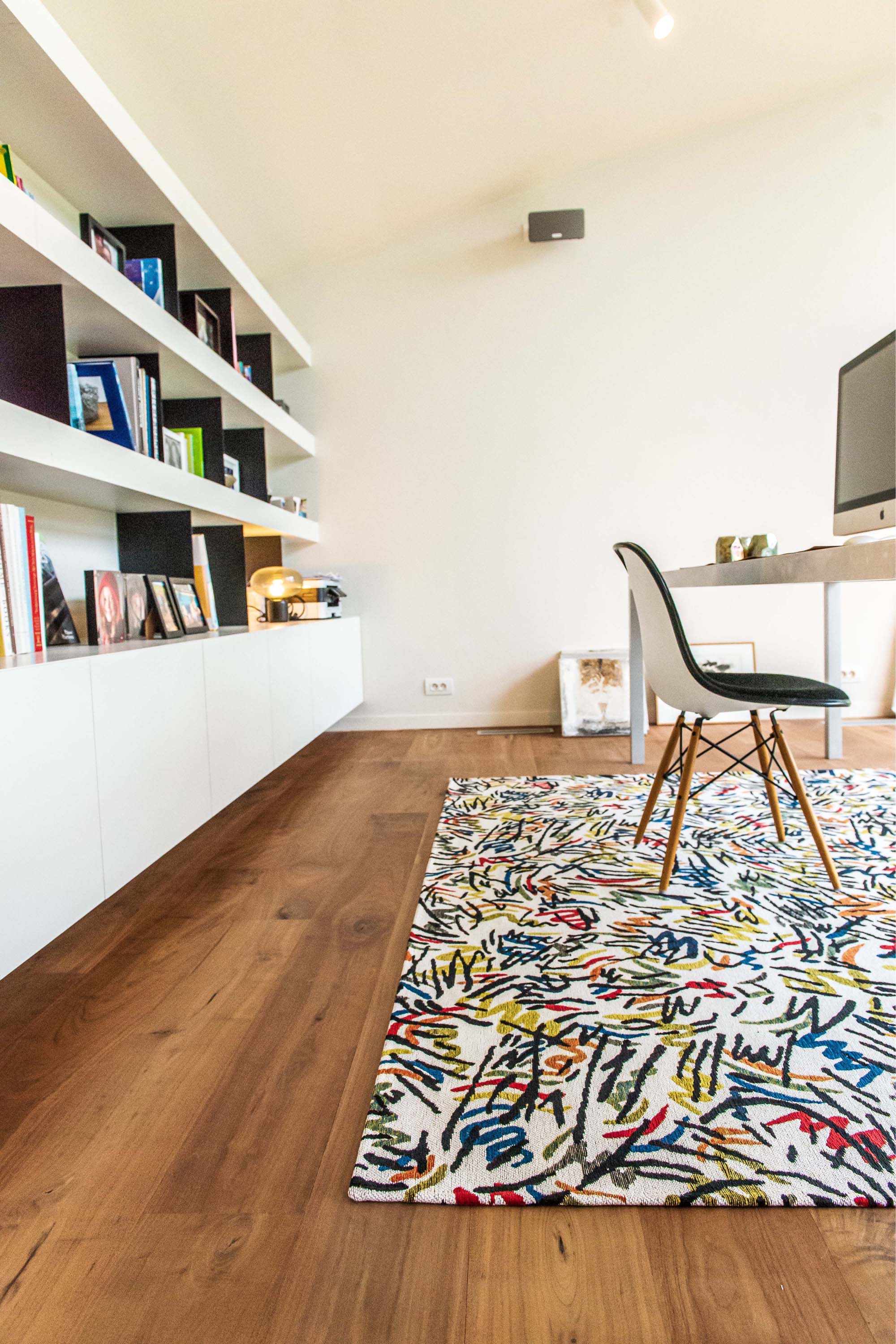 multicolour abstract rug with a squiggle design