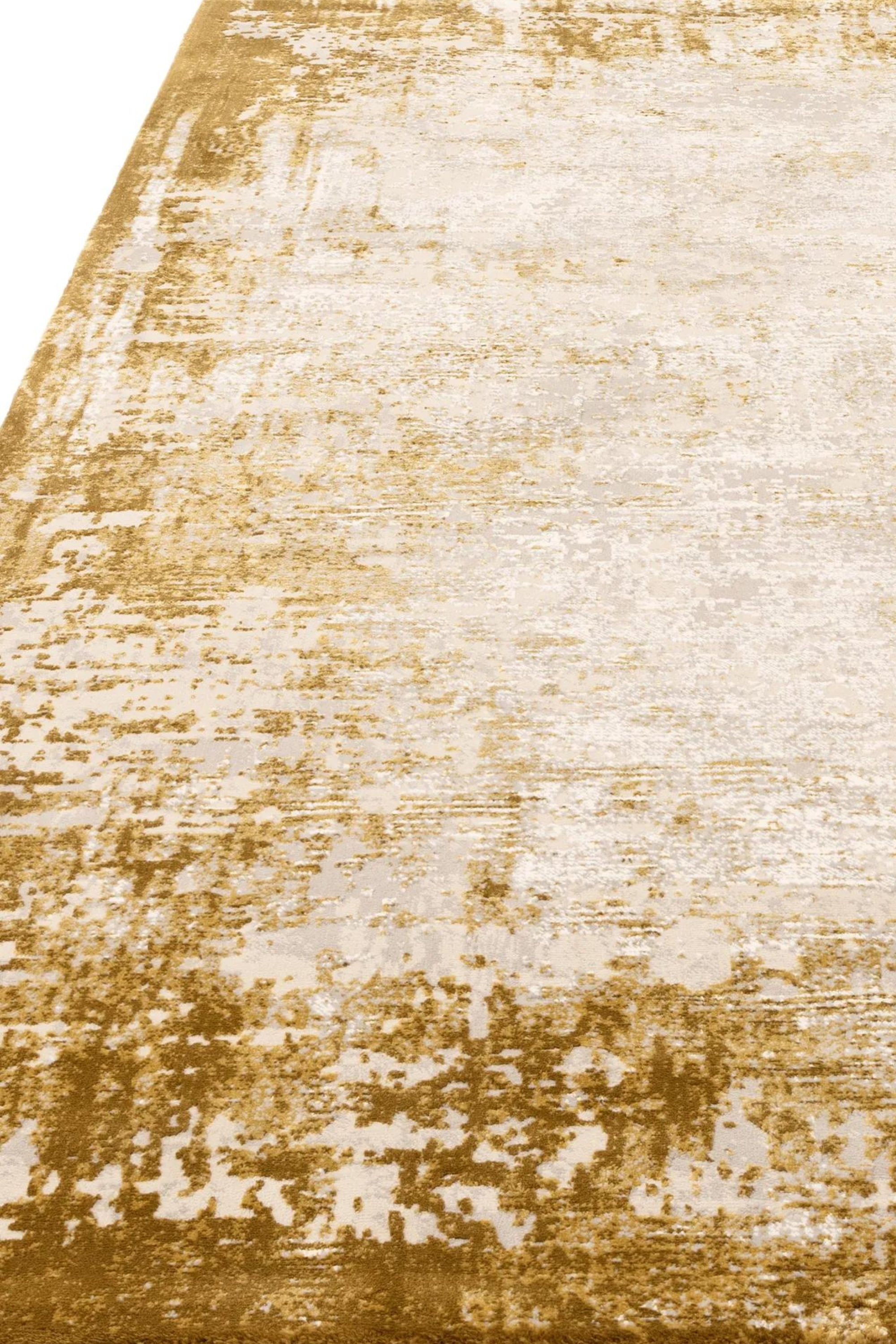 Modern flatweave rug with abstract gold design