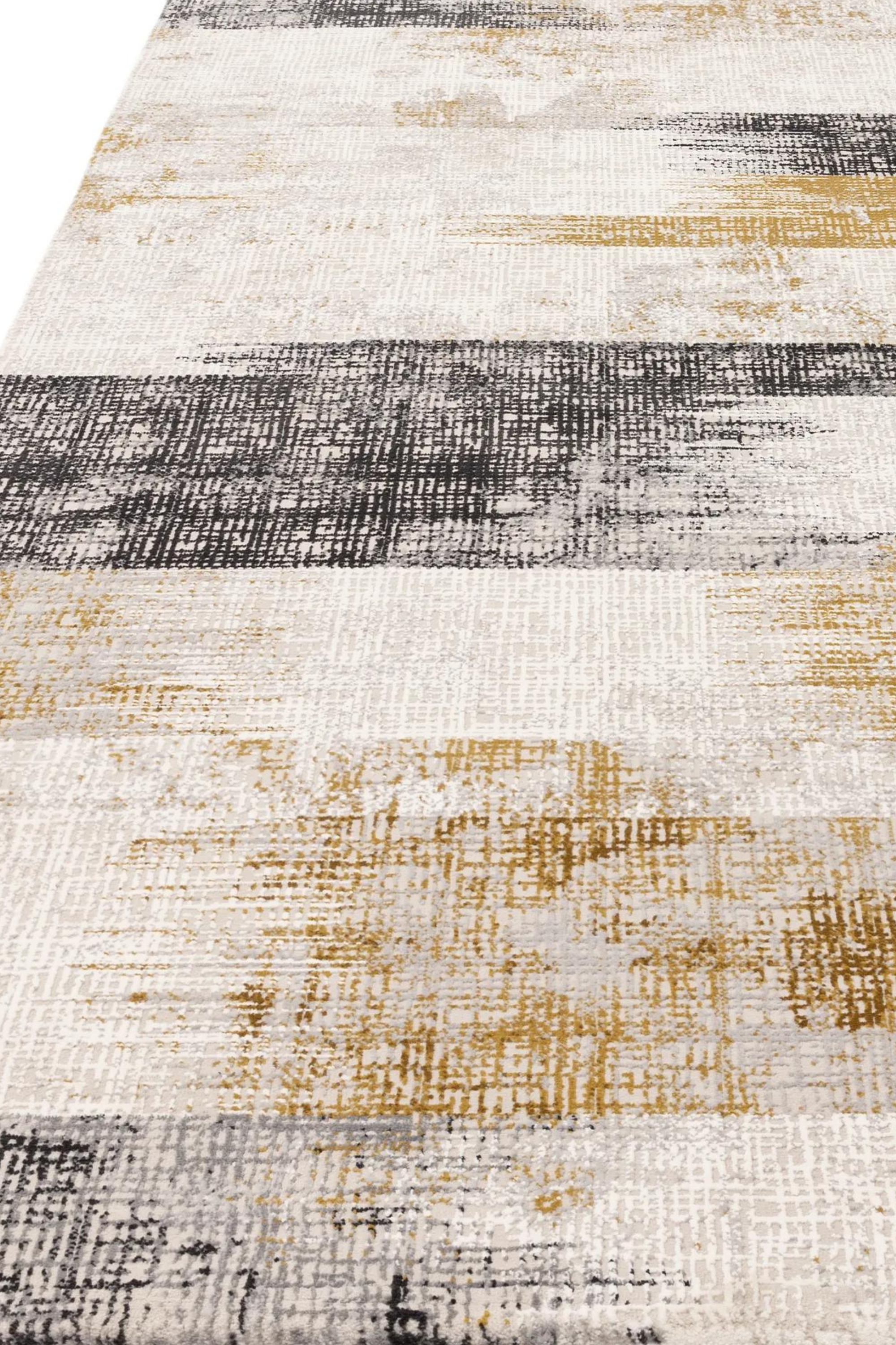 Modern flatweave rug with abstract gold design