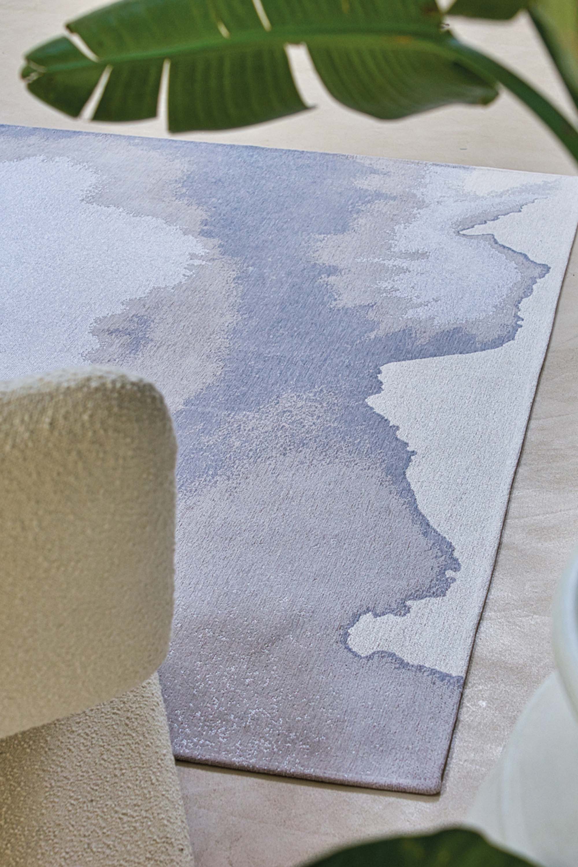 Modern rug with grey abstract shoreline pattern