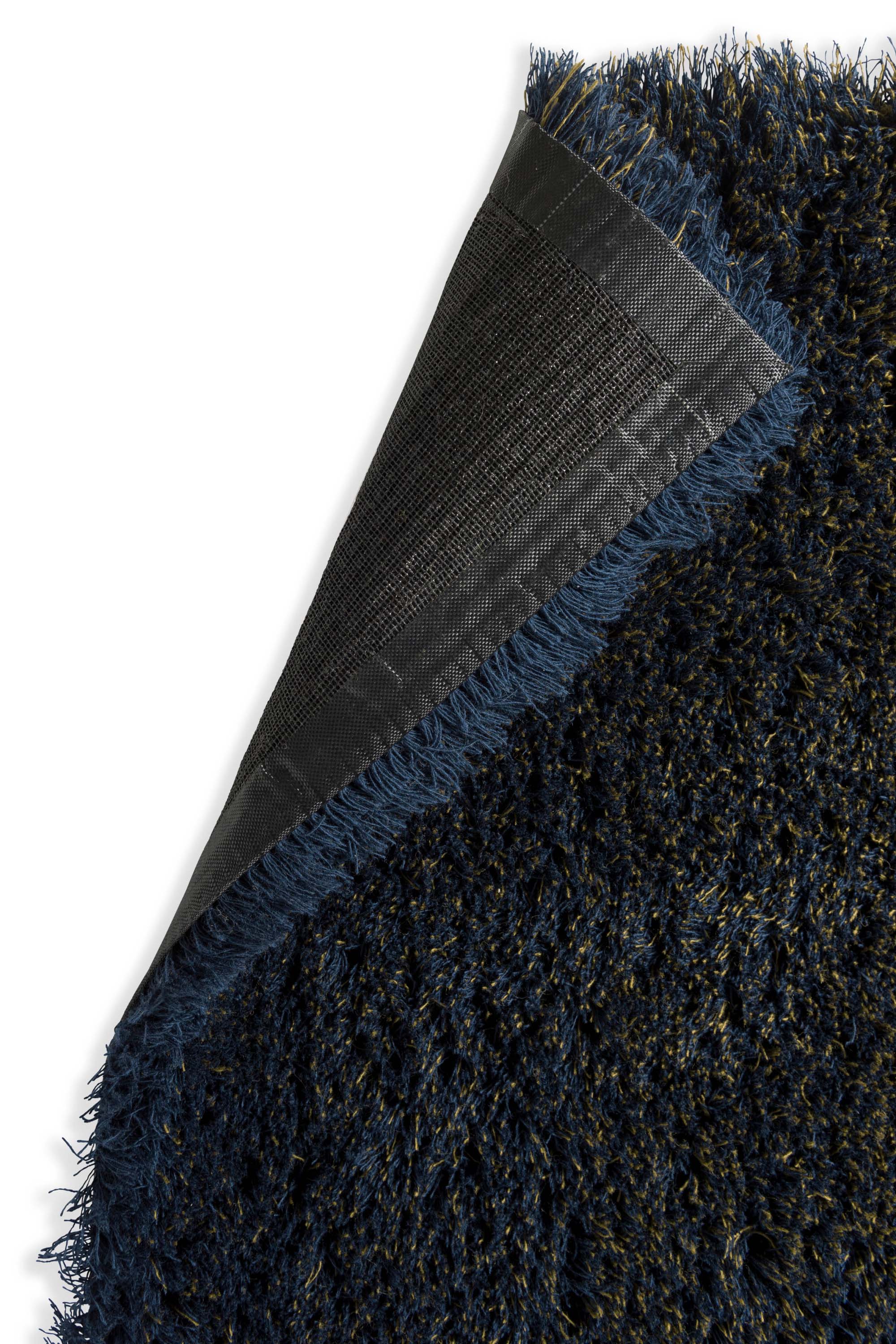 Plain green rug with shaggy pile