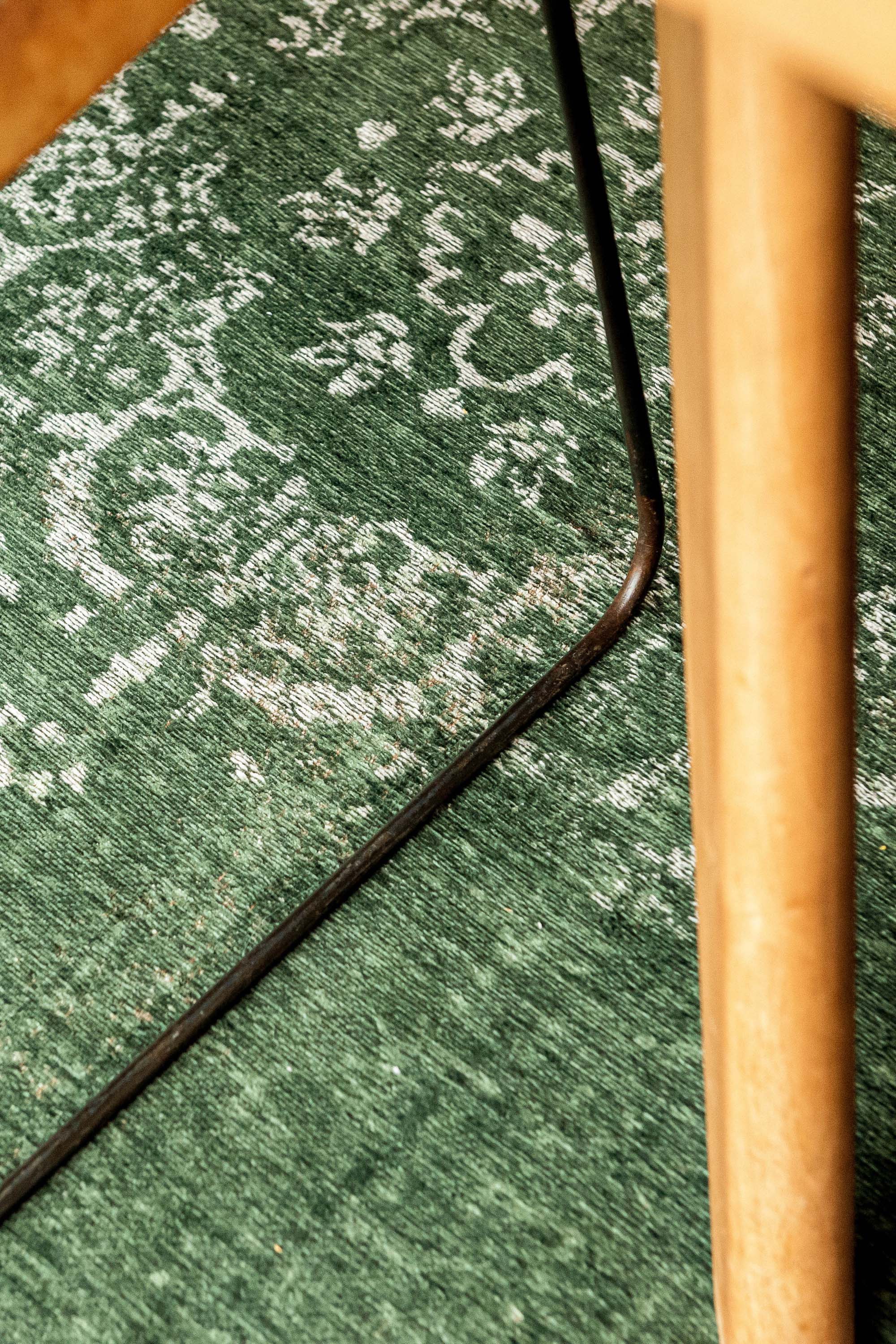 green vintage style rug