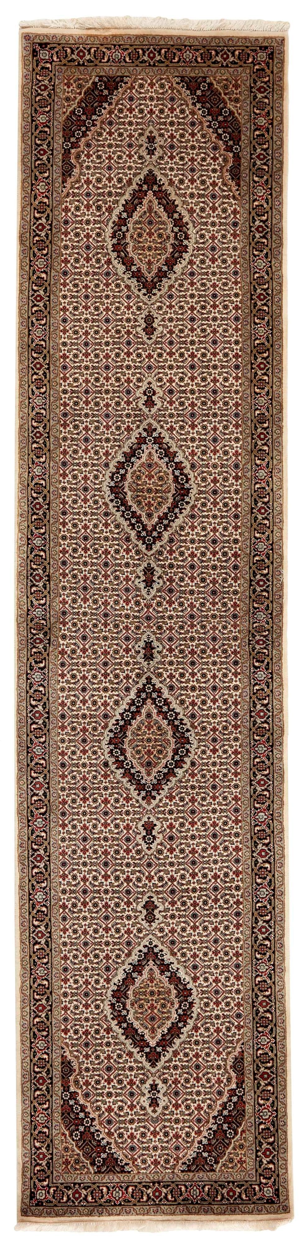 Authentic Oriental runner with traditional geometric and floral design in red, beige, brown and black