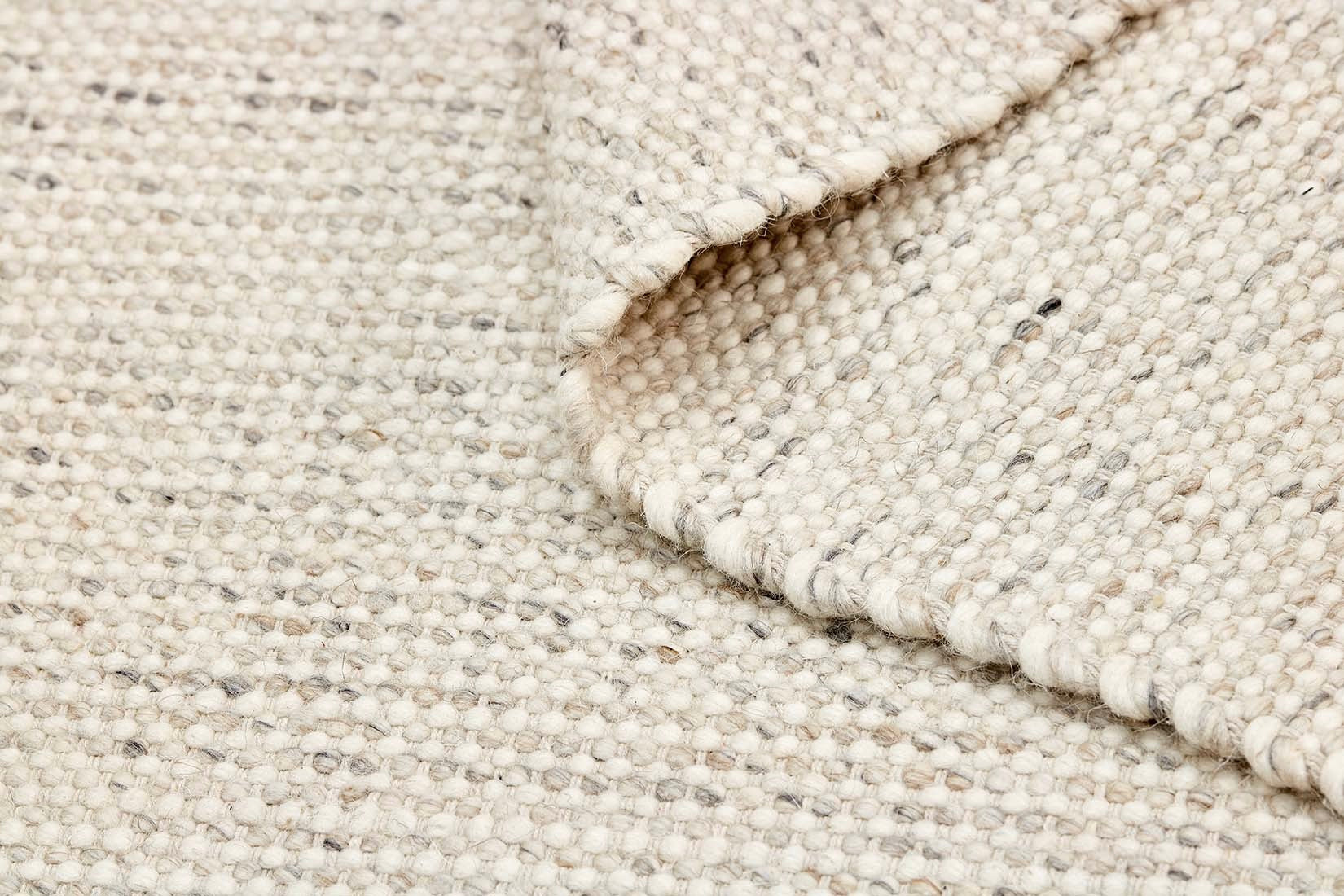 Grey textured area rug