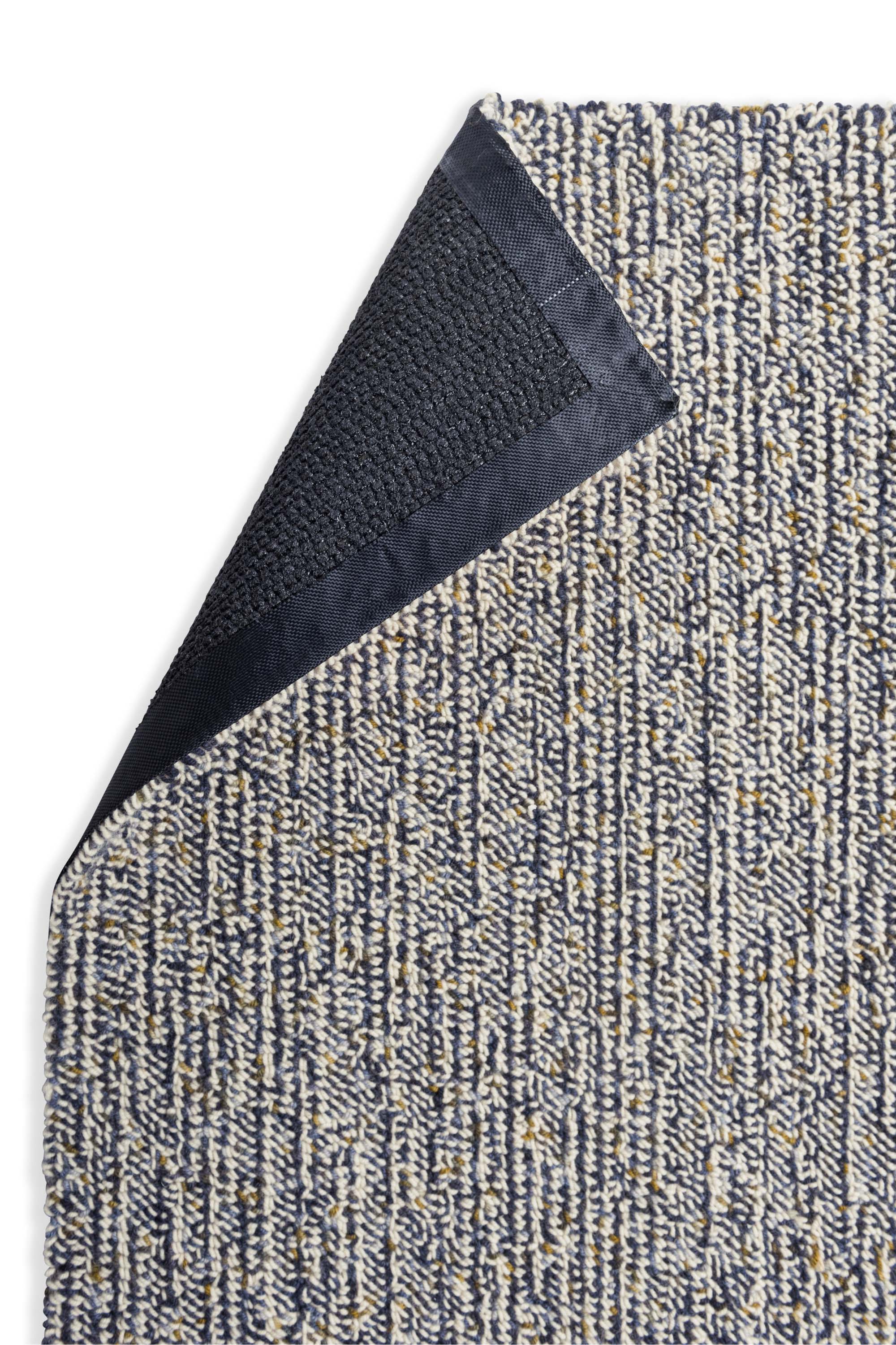 Plain flatweave rug with blue pile