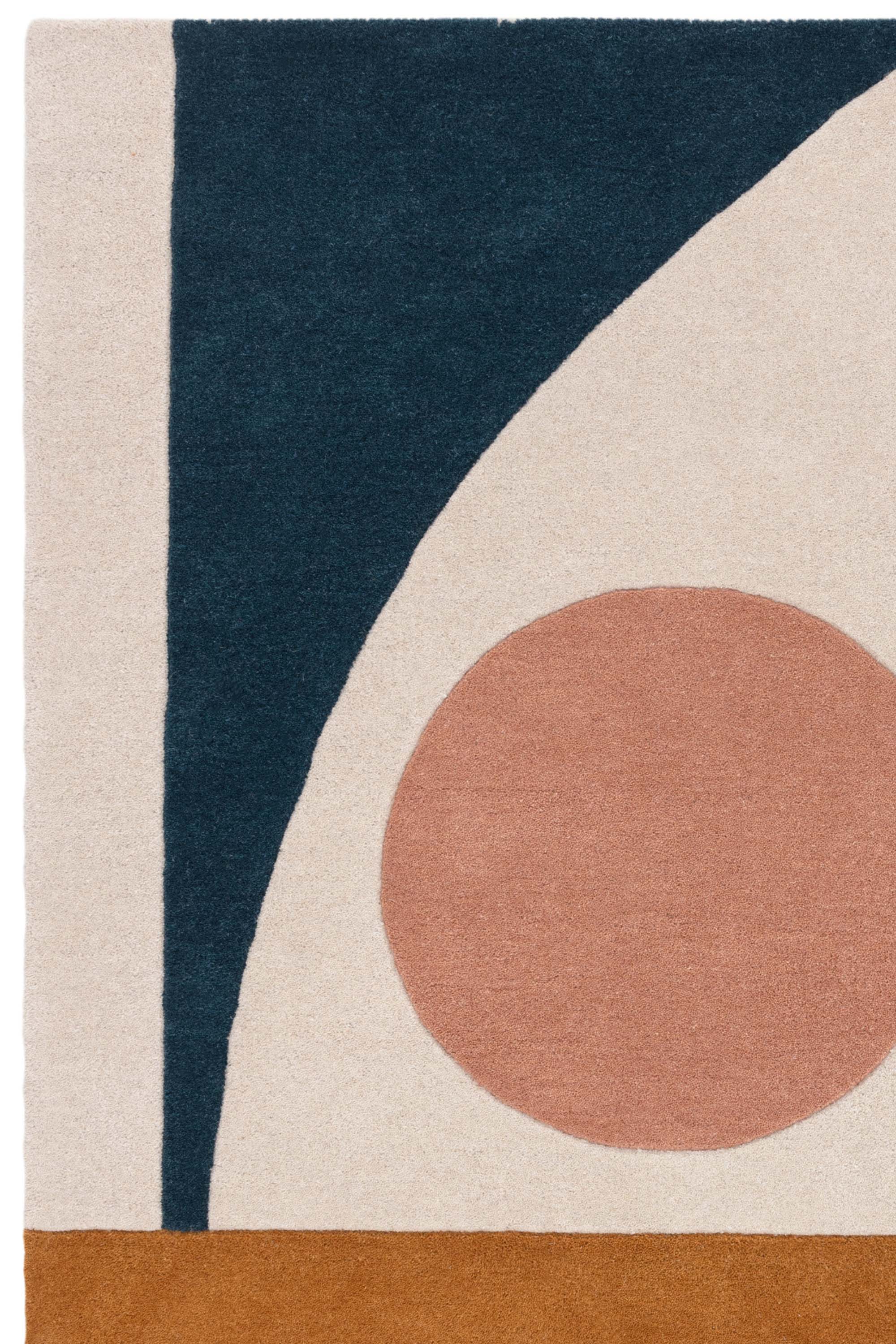 Geometric wool rug featuring a multicolour pattern