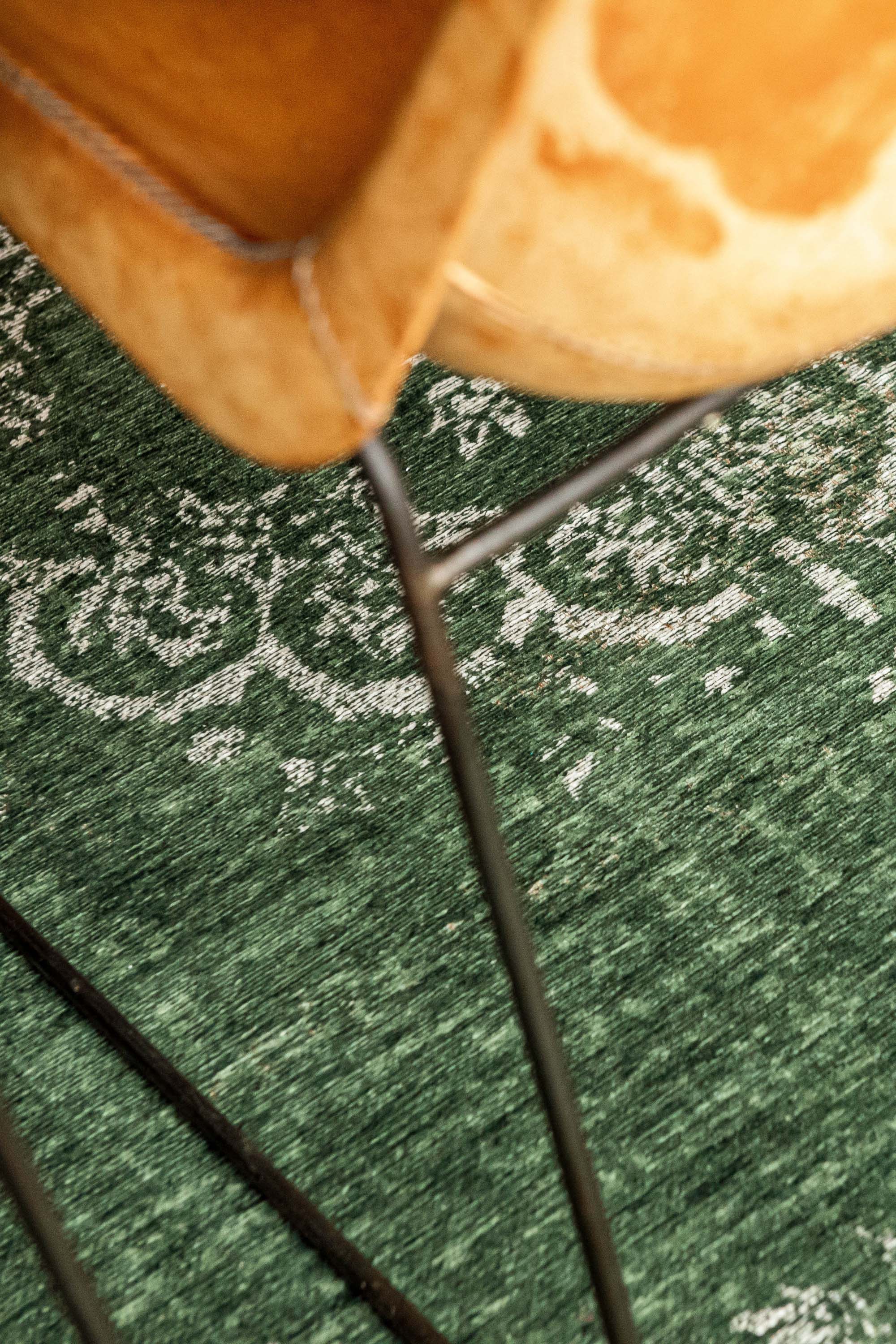 green vintage style rug