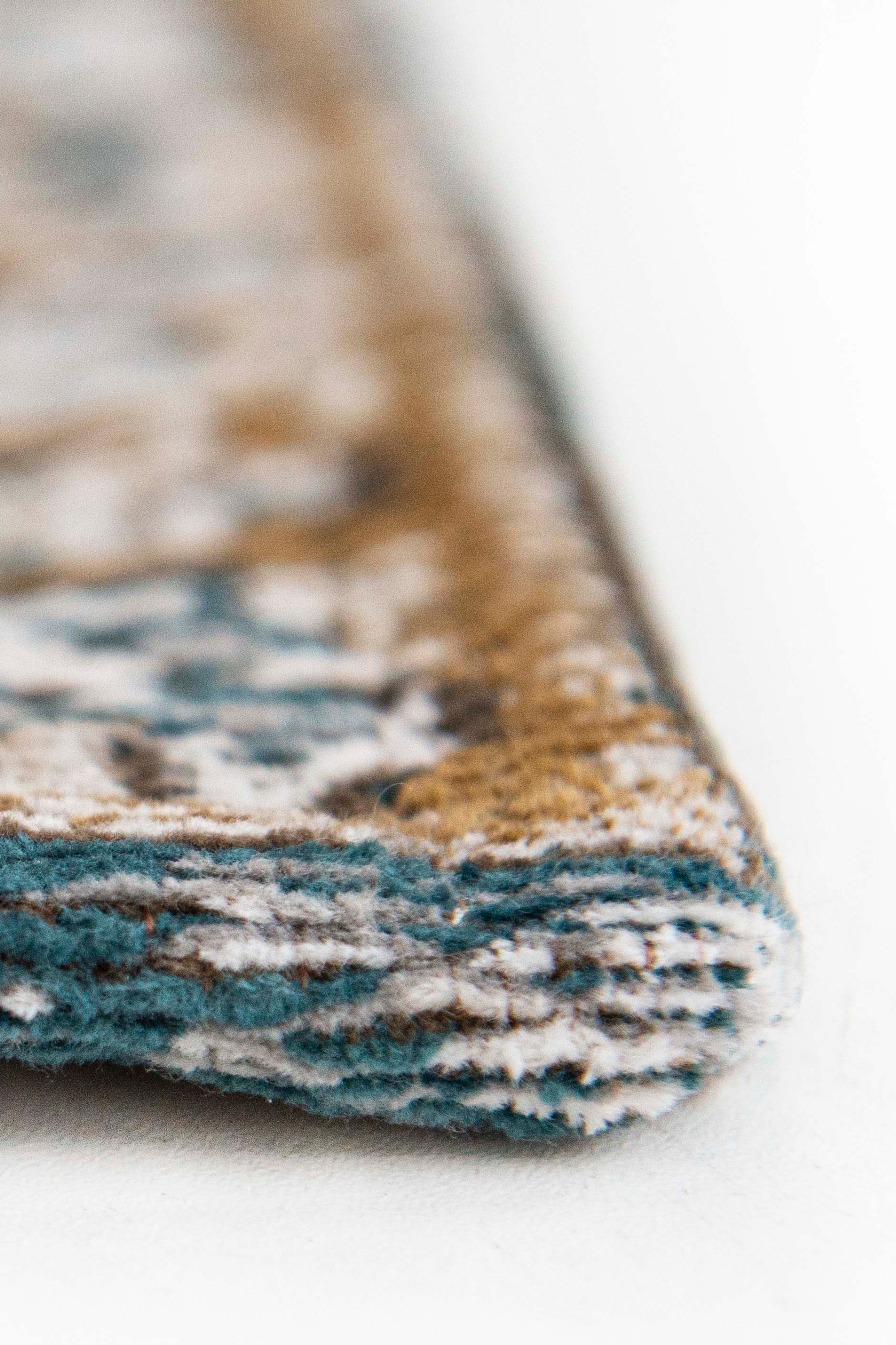 white, blue and yellow vintage style rug