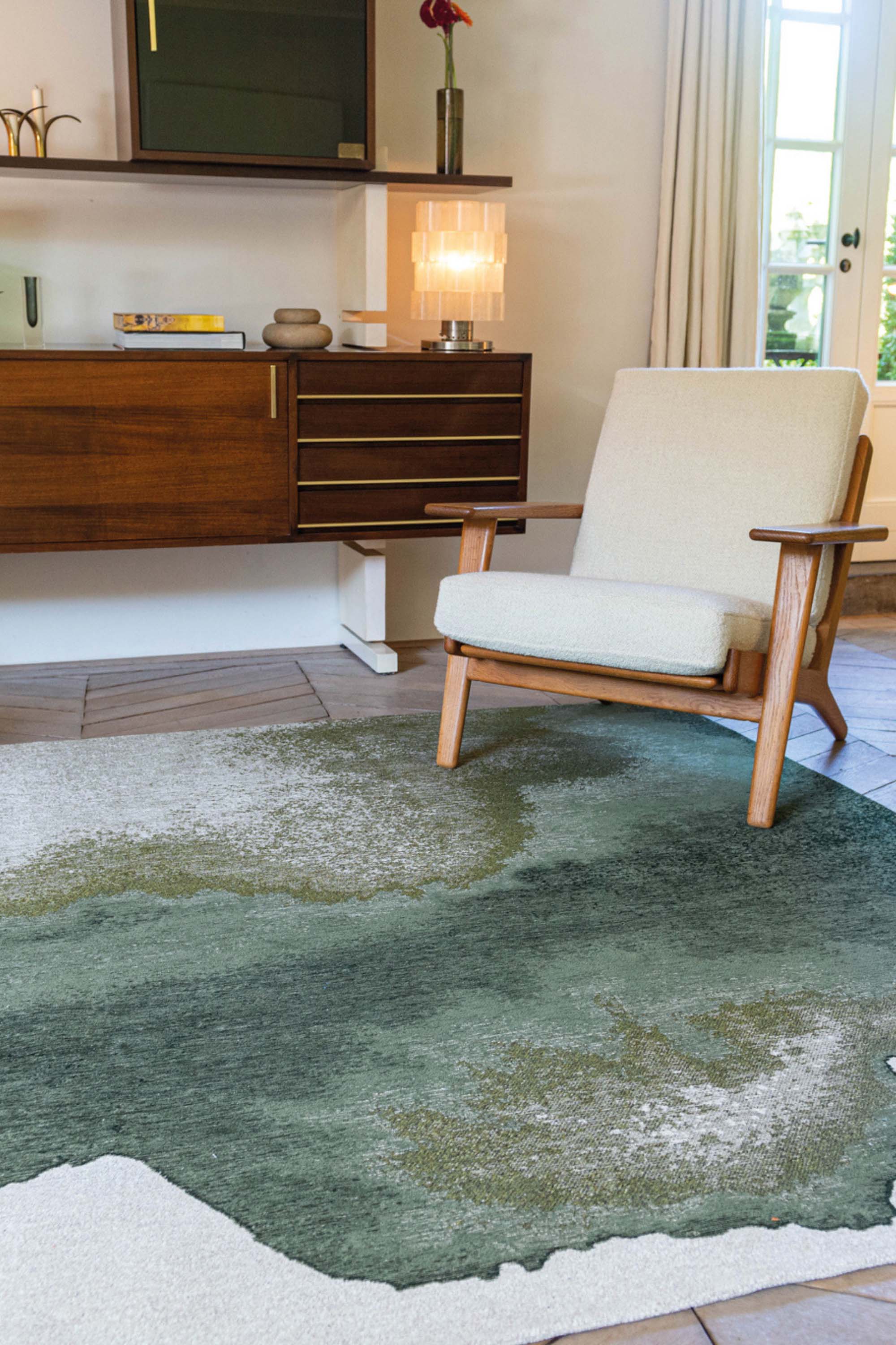 Modern rug with green abstract shoreline pattern