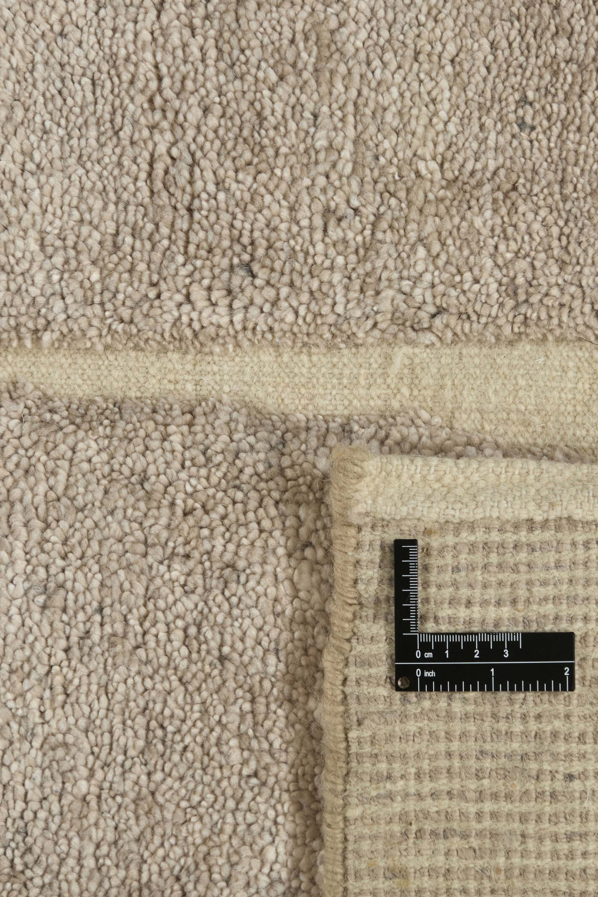 Minimal beige luxury Moroccan style rug