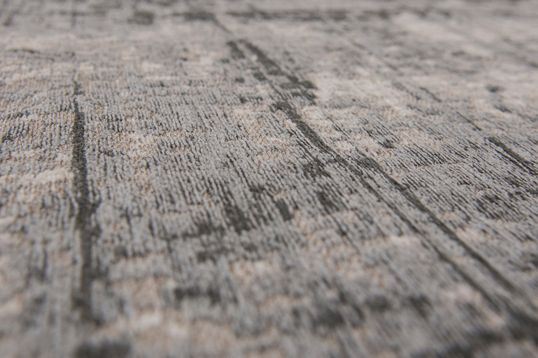 White flatweave rug with grey abstract pattern