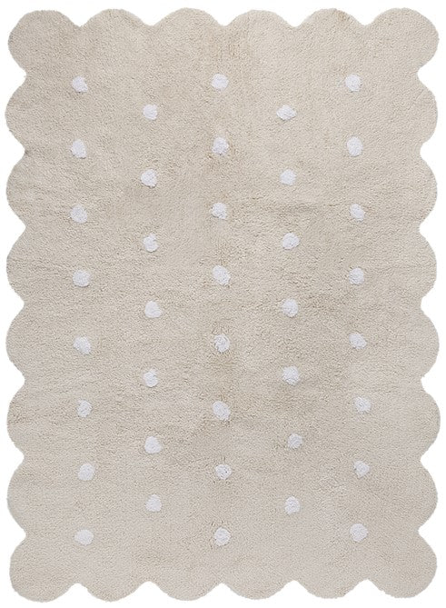 Rectangular beige cotton rug with scalloped border and white polka dot design