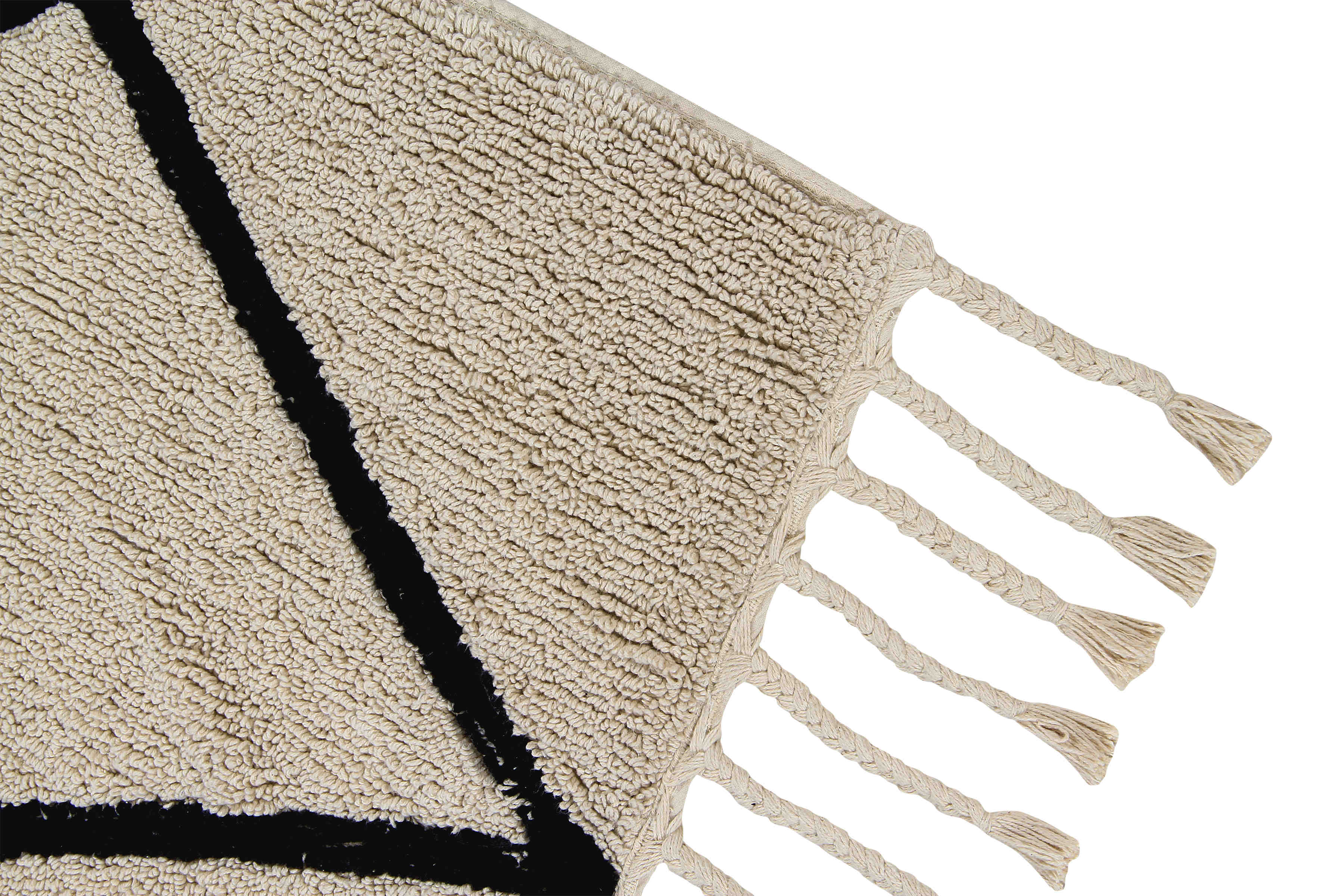 Rectangular beige cotton rug decorated with a black geometric tribal design and braided border