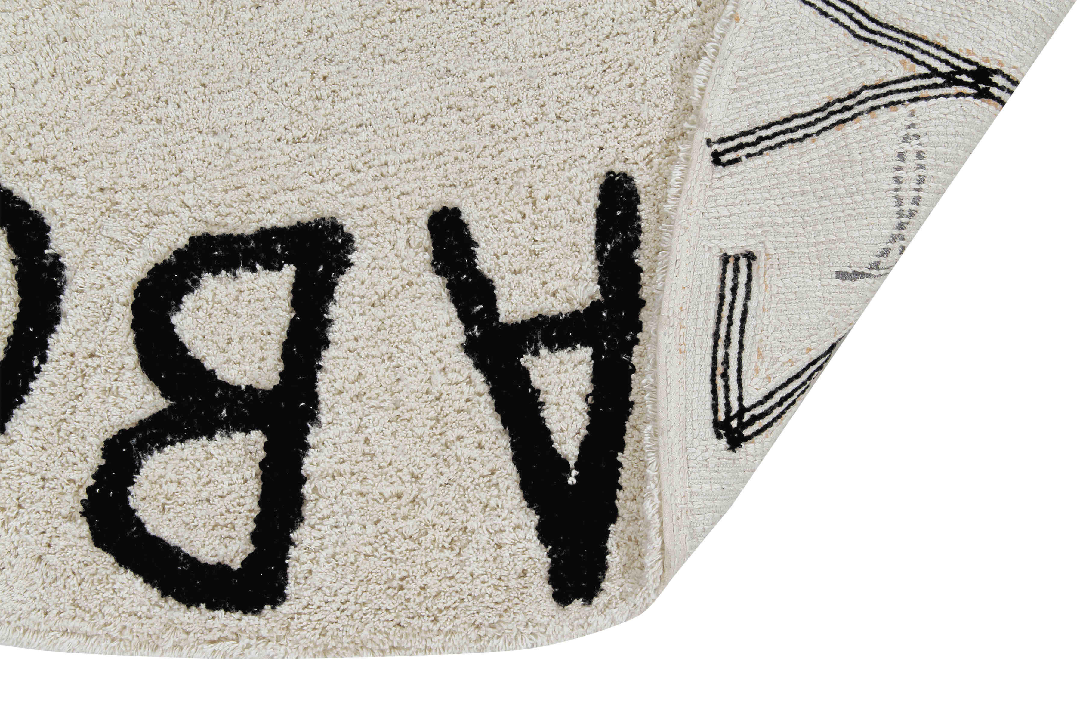 Circular white cotton rug decorated with a black alphabet border