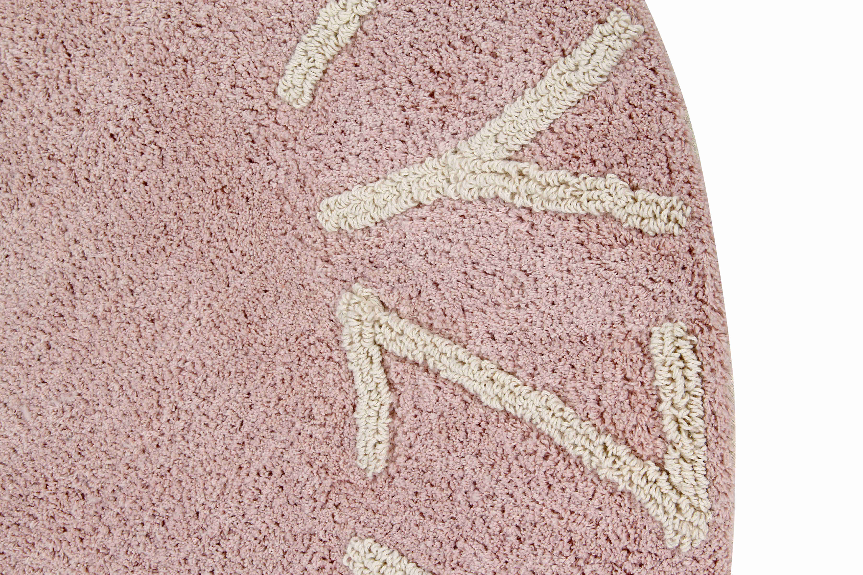 Circular pink cotton rug decorated with a natural beige alphabet border