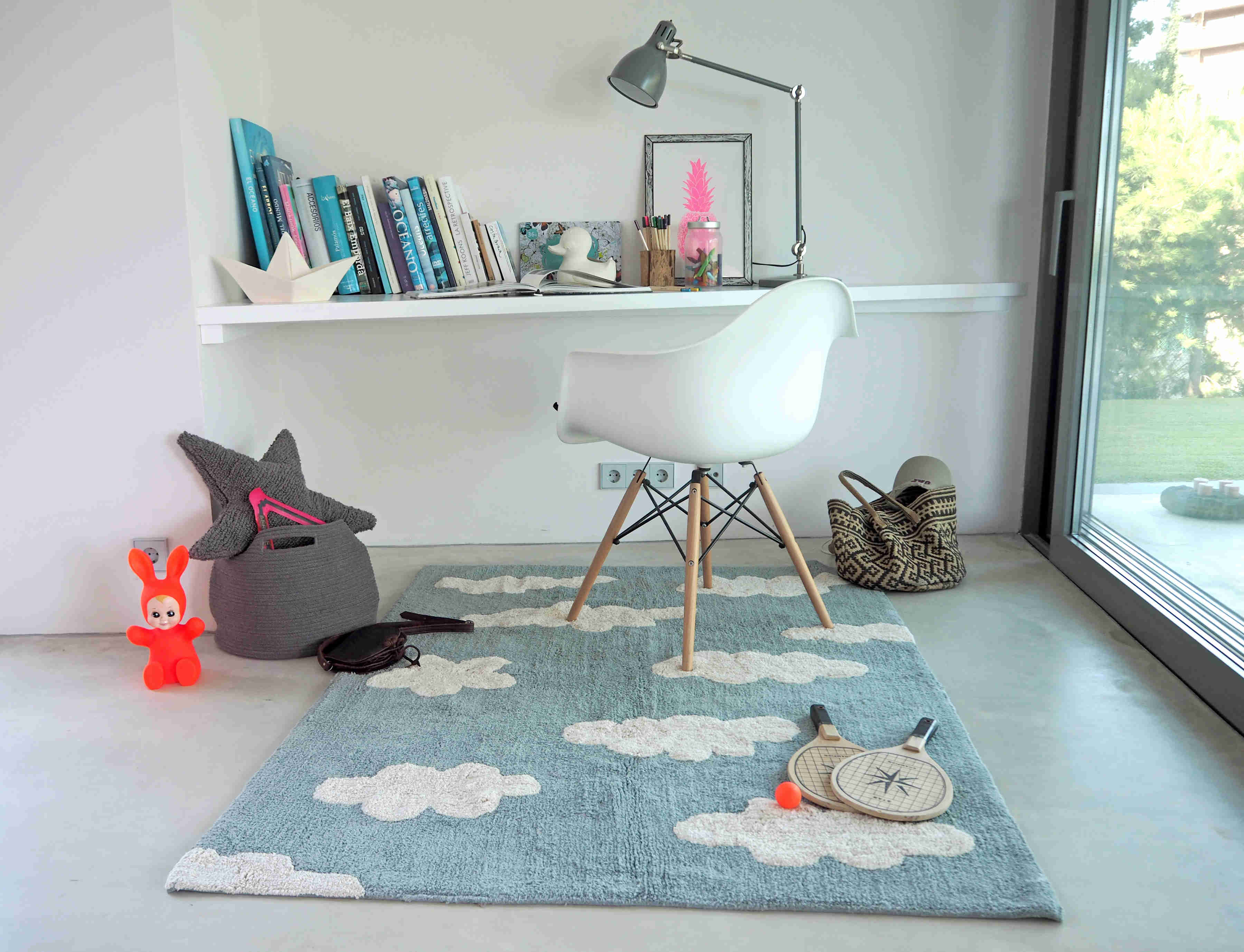 Rectangular blue cotton rug with white cloud design